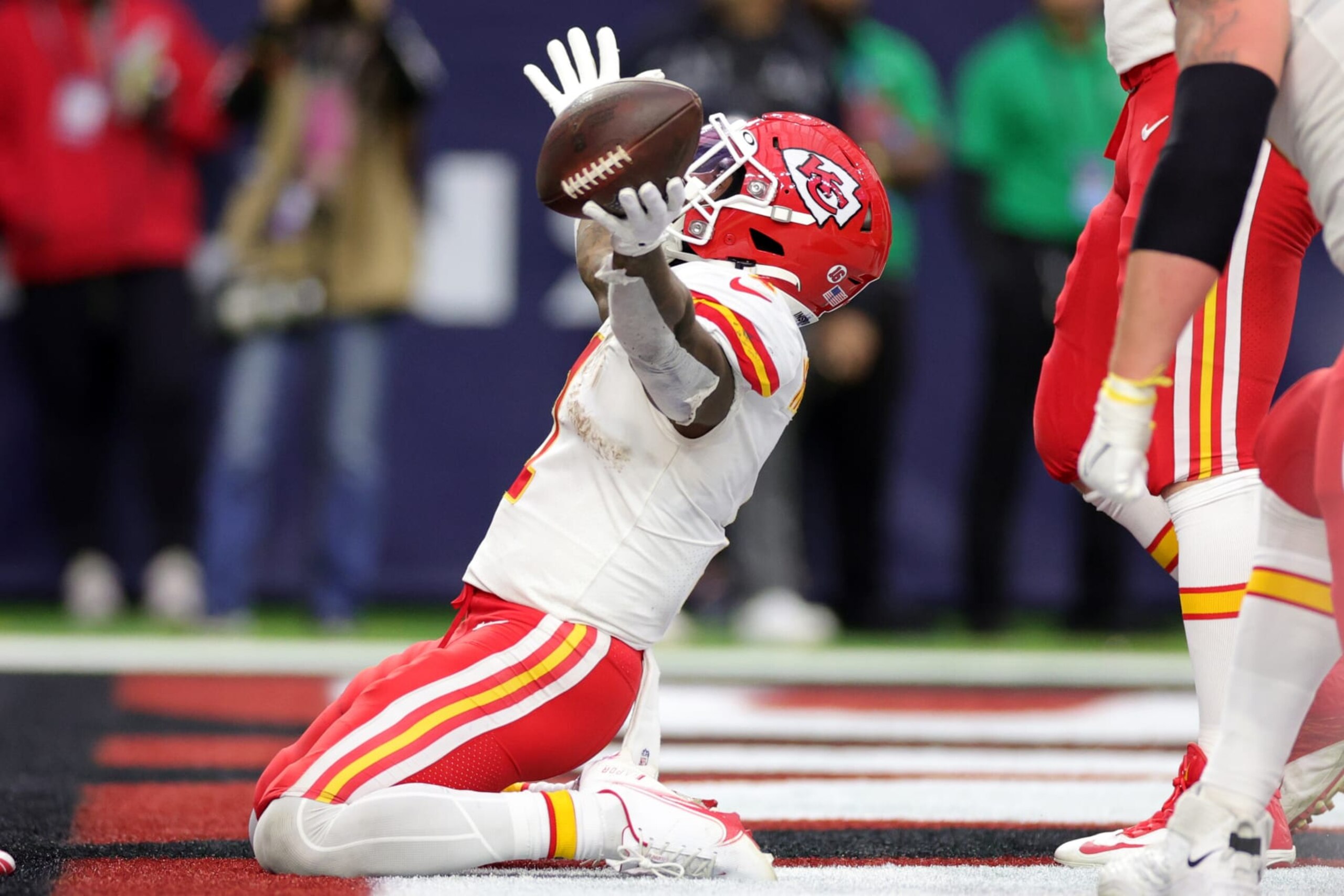 HOUSTON, TEXAS - DECEMBER 18: Jerick McKinnon #1 of the Kansas City Chiefs celebrates a 2-point conversion during the fourth quarter against the Houston Texans at NRG Stadium on December 18, 2022 in Houston, Texas. (Photo by Carmen Mandato/Getty Images)