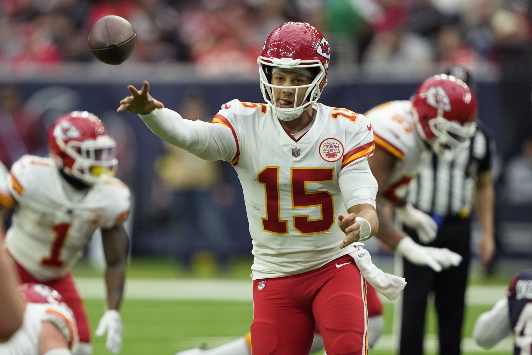 Kansas City Chiefs quarterback Patrick Mahomes (15) throws against the Houston Texans during the first half of an NFL football game Sunday, Dec. 18, 2022, in Houston. (AP Photo/David J. Phillip) Kansas City Chiefs quarterback Patrick Mahomes (15) throws against the Houston Texans during the first half of an NFL football game Sunday, Dec. 18, 2022, in Houston. (AP Photo/David J. Phillip)