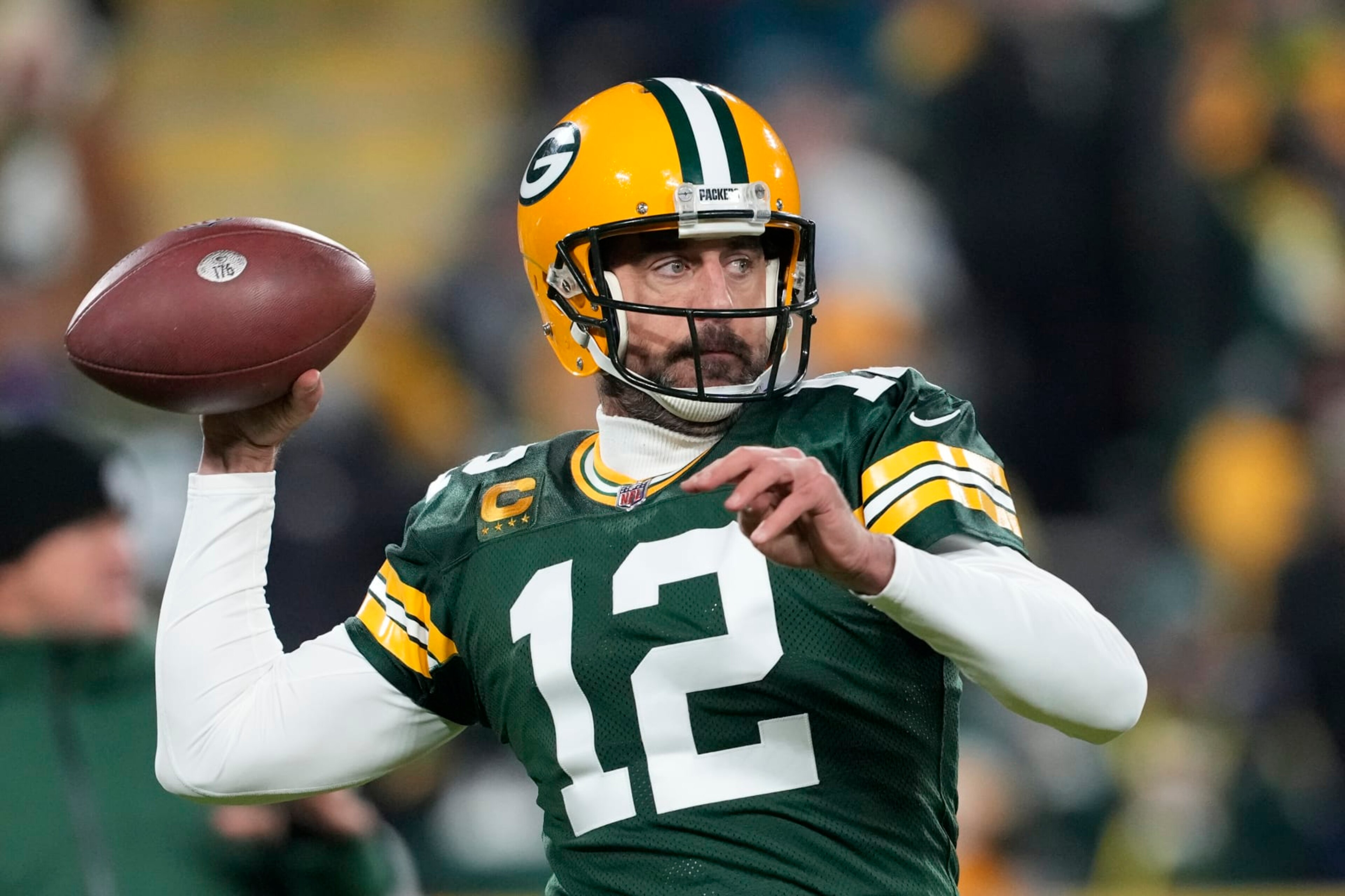 GREEN BAY, WISCONSIN - DECEMBER 19: Aaron Rodgers #12 of the Green Bay Packers warms up prior to playing the Los Angeles Rams at Lambeau Field on December 19, 2022 in Green Bay, Wisconsin. (Photo by Patrick McDermott/Getty Images)