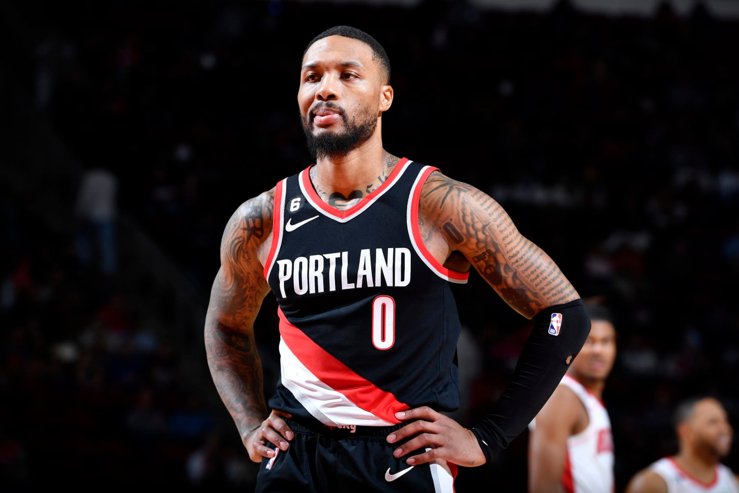 HOUSTON, TX - DECEMBER 17: Damian Lillard #0 of the Portland Trail Blazers looks on during the game against the Houston Rockets  on December 17, 2022 at the Toyota Center in Houston, Texas. NOTE TO USER: User expressly acknowledges and agrees that, by downloading and or using this photograph, User is consenting to the terms and conditions of the Getty Images License Agreement. Mandatory Copyright Notice: Copyright 2022 NBAE (Photo by Logan Riely/NBAE via Getty Images)