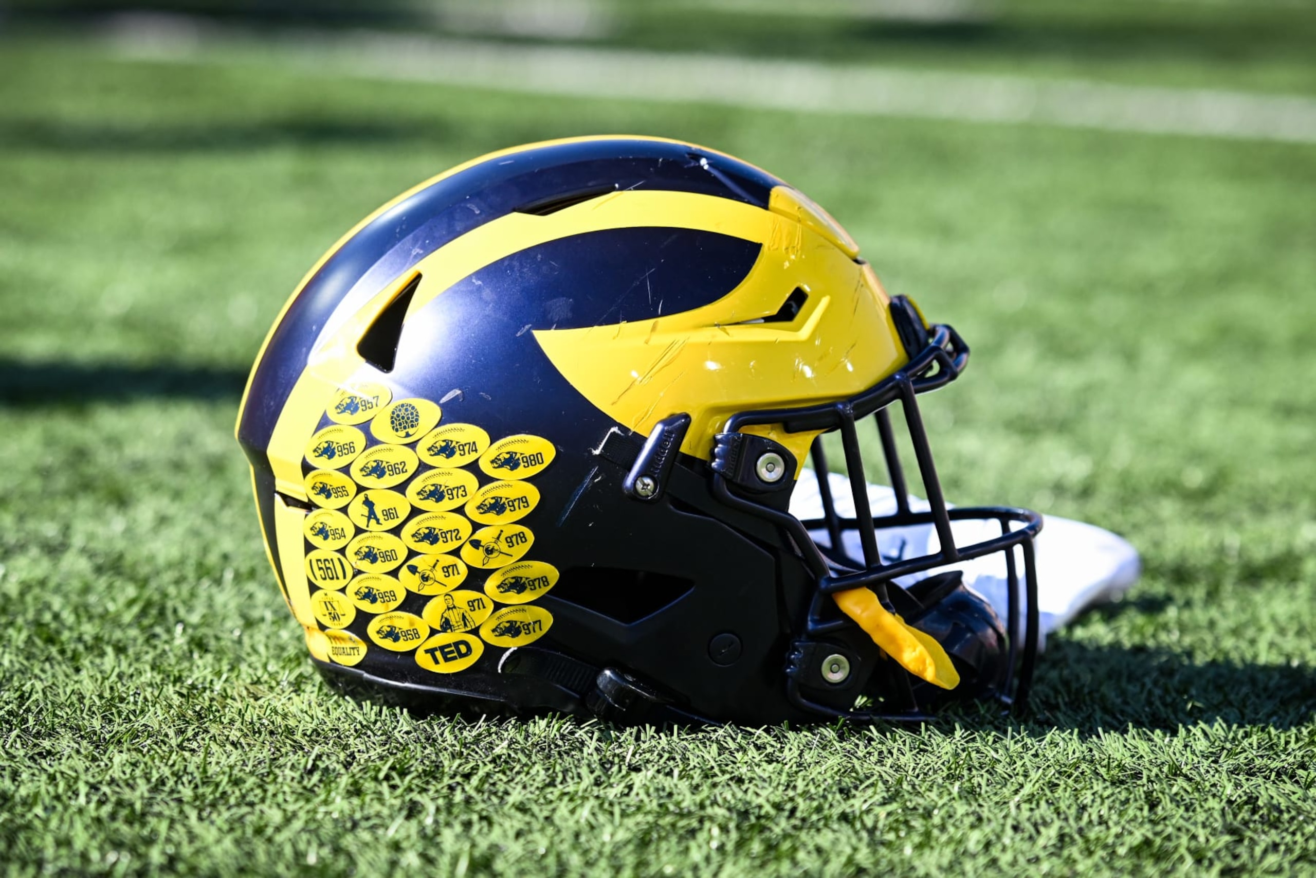BLOOMINGTON, IN - OCTOBER 08: A Michigan football helmet sits on the field following a college football game between the Michigan Wolverines and Indiana Hoosiers on October 8, 2022 at Memorial Stadium in Bloomington, Indiana. (Photo by James Black/Icon Sportswire via Getty Images)