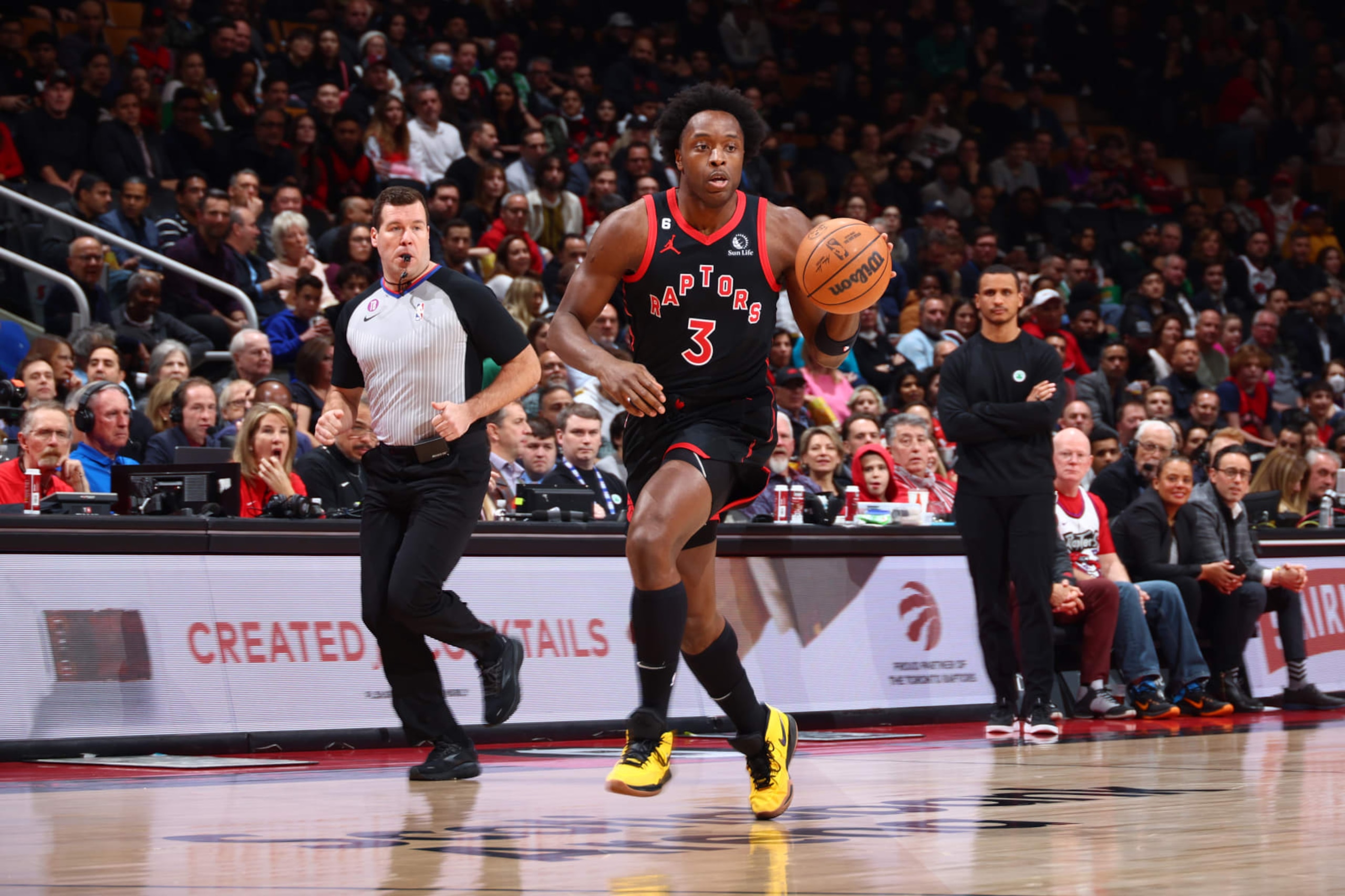 TORONTO, CANADA - DECEMBER 5: OG Anunoby #3 of the Toronto Raptors dribbles the ball during the game against the Boston Celtics on December 5, 2022 at the Scotiabank Arena in Toronto, Ontario, Canada.  NOTE TO USER: User expressly acknowledges and agrees that, by downloading and or using this Photograph, user is consenting to the terms and conditions of the Getty Images License Agreement.  Mandatory Copyright Notice: Copyright 2022 NBAE (Photo by Vaughn Ridley/NBAE via Getty Images)