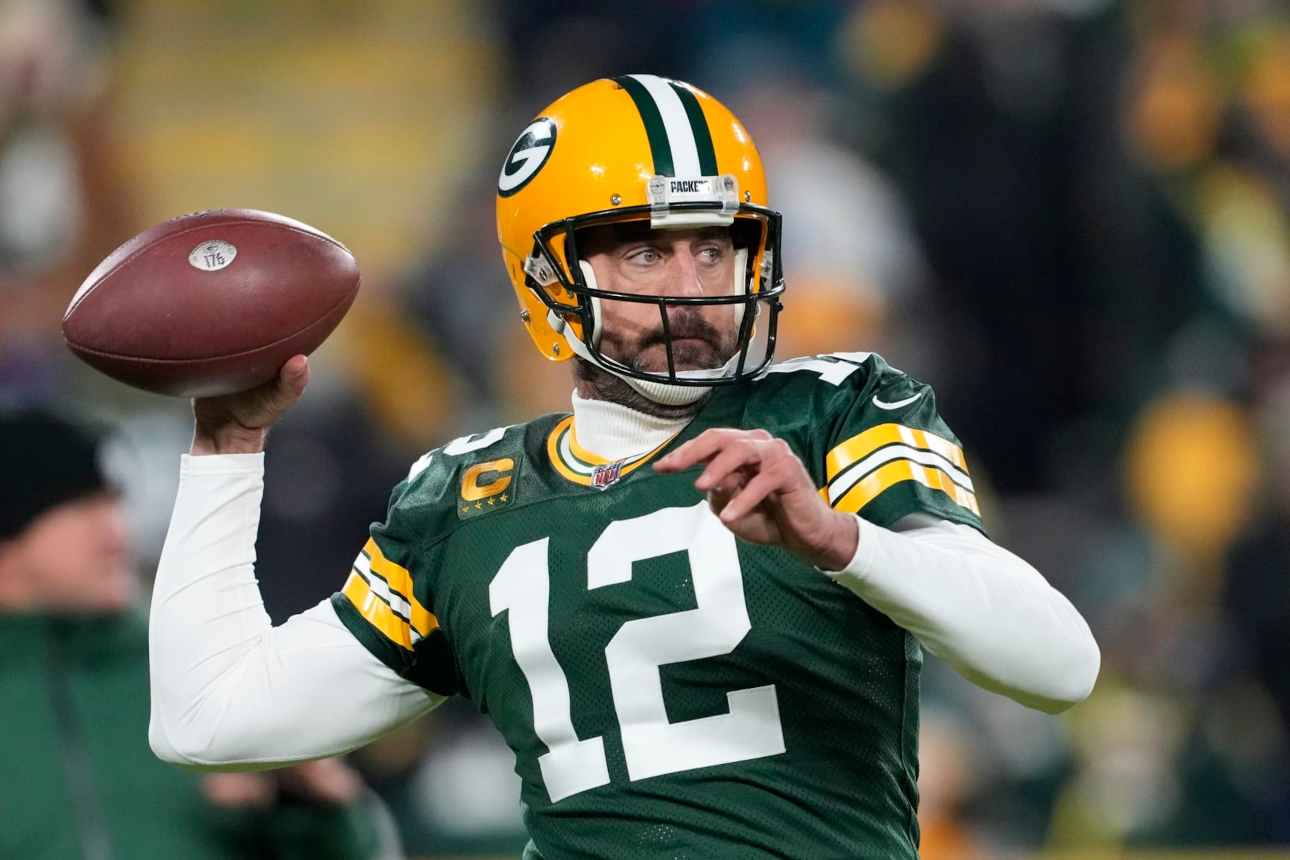 GREEN BAY, WISCONSIN - DECEMBER 19: Aaron Rodgers #12 of the Green Bay Packers warms up prior to playing the Los Angeles Rams at Lambeau Field on December 19, 2022 in Green Bay, Wisconsin. (Photo by Patrick McDermott/Getty Images)