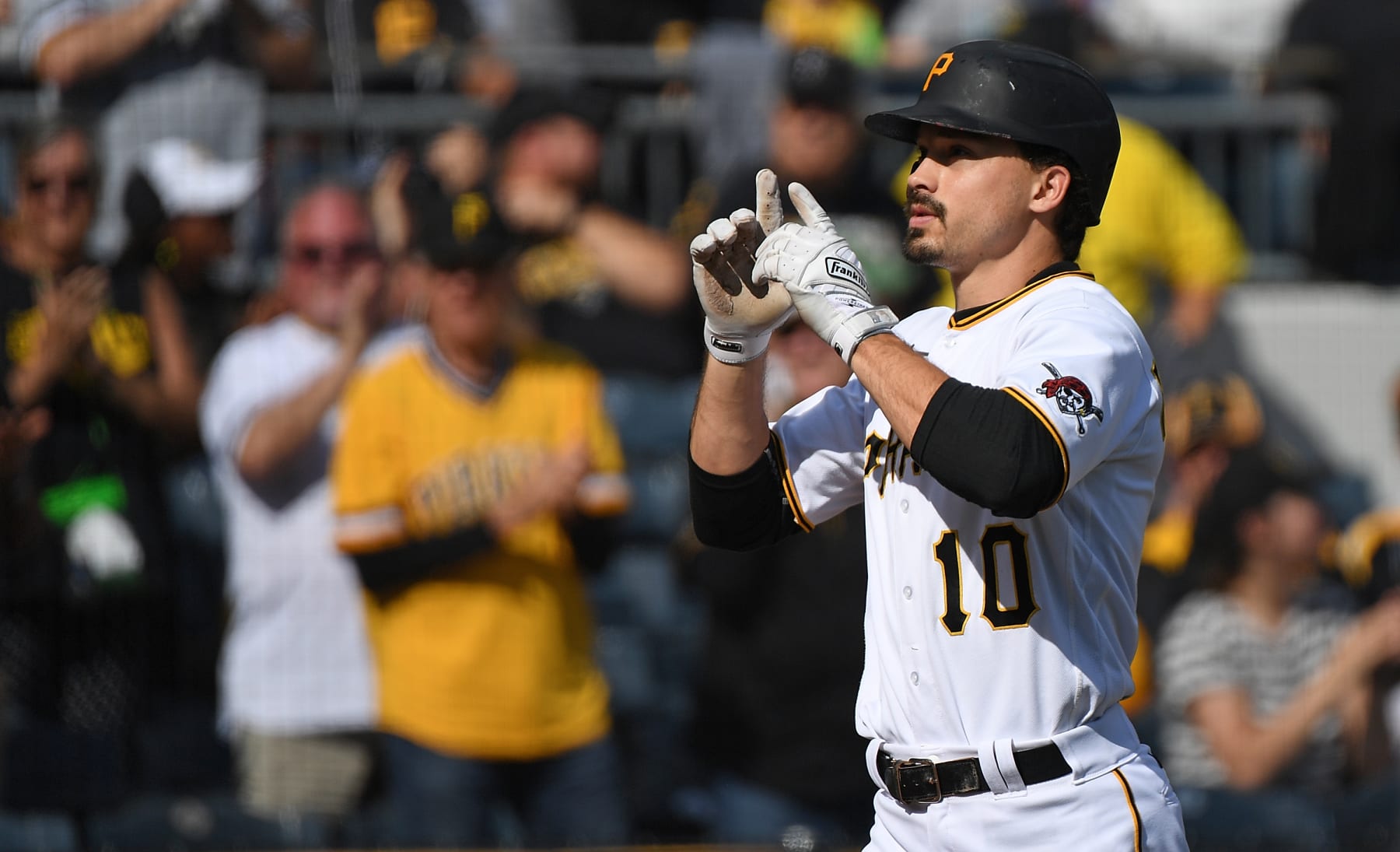 PITTSBURGH, PA - SEPTEMBER 25: Bryan Reynolds #10 of the Pittsburgh Pirates reacts as he crosses home plate after hitting a solo home run in the sixth inning during the game against the Chicago Cubs at PNC Park on September 25, 2022 in Pittsburgh, Pennsylvania. (Photo by Justin Berl/Getty Images)