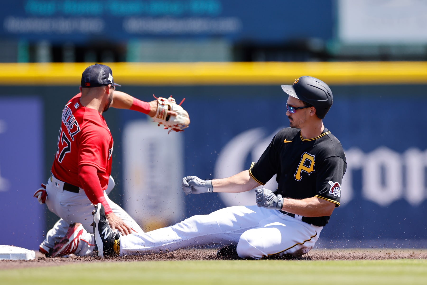 BRADENTON, FL - MARCH 29: Pittsburgh Pirates outfielder Bryan Reynolds (10) slides safely at second base with a double during a spring training baseball game against the Boston Red Sox on March 29, 2022 at LECOM Park in Bradenton, Florida. (Photo by Joe Robbins/Icon Sportswire via Getty Images)