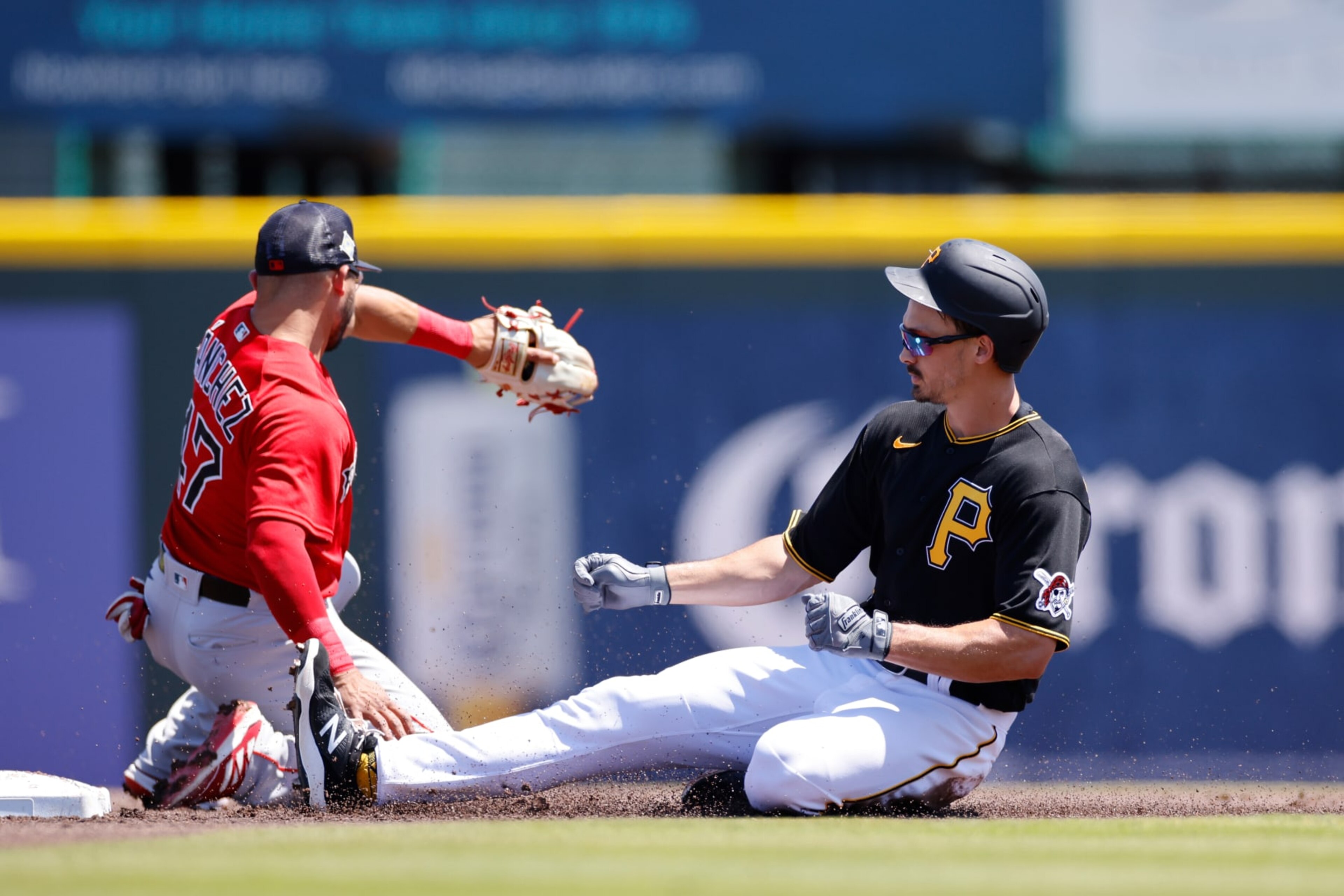 BRADENTON, FL - MARCH 29: Pittsburgh Pirates outfielder Bryan Reynolds (10) slides safely at second base with a double during a spring training baseball game against the Boston Red Sox on March 29, 2022 at LECOM Park in Bradenton, Florida. (Photo by Joe Robbins/Icon Sportswire via Getty Images) BRADENTON, FL - MARCH 29: Pittsburgh Pirates outfielder Bryan Reynolds (10) slides safely at second base with a double during a spring training baseball game against the Boston Red Sox on March 29, 2022 at LECOM Park in Bradenton, Florida. (Photo by Joe Robbins/Icon Sportswire via Getty Images)