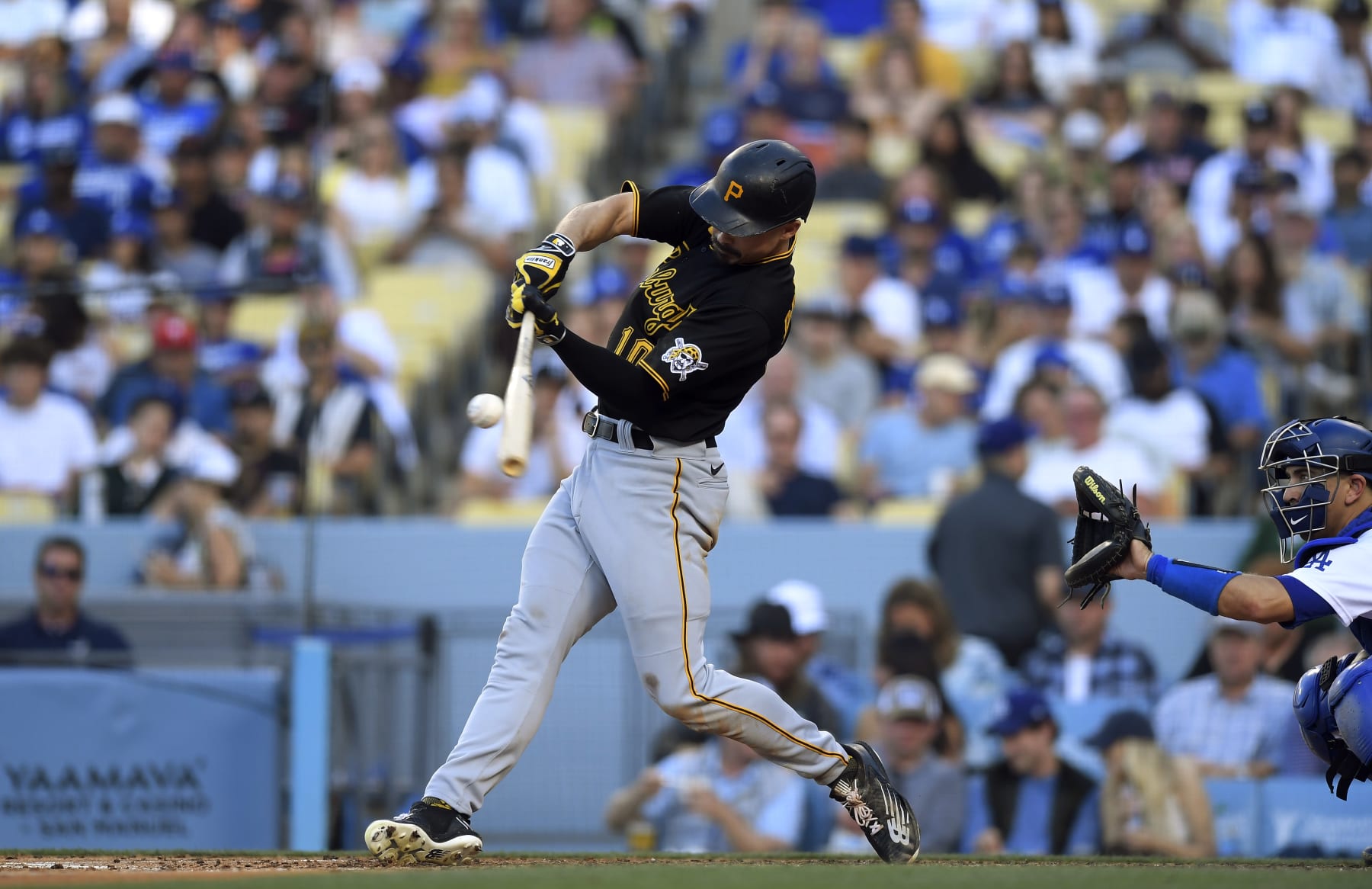 LOS ANGELES, CA - JUNE 01: Bryan Reynolds #10 of the Pittsburgh Pirates hits a two-run home run against starting pitcher Mitch White of the Los Angeles Dodgers in the fifth inning at Dodger Stadium on June 1, 2022 in Los Angeles, California. (Photo by Kevork Djansezian/Getty Images)
