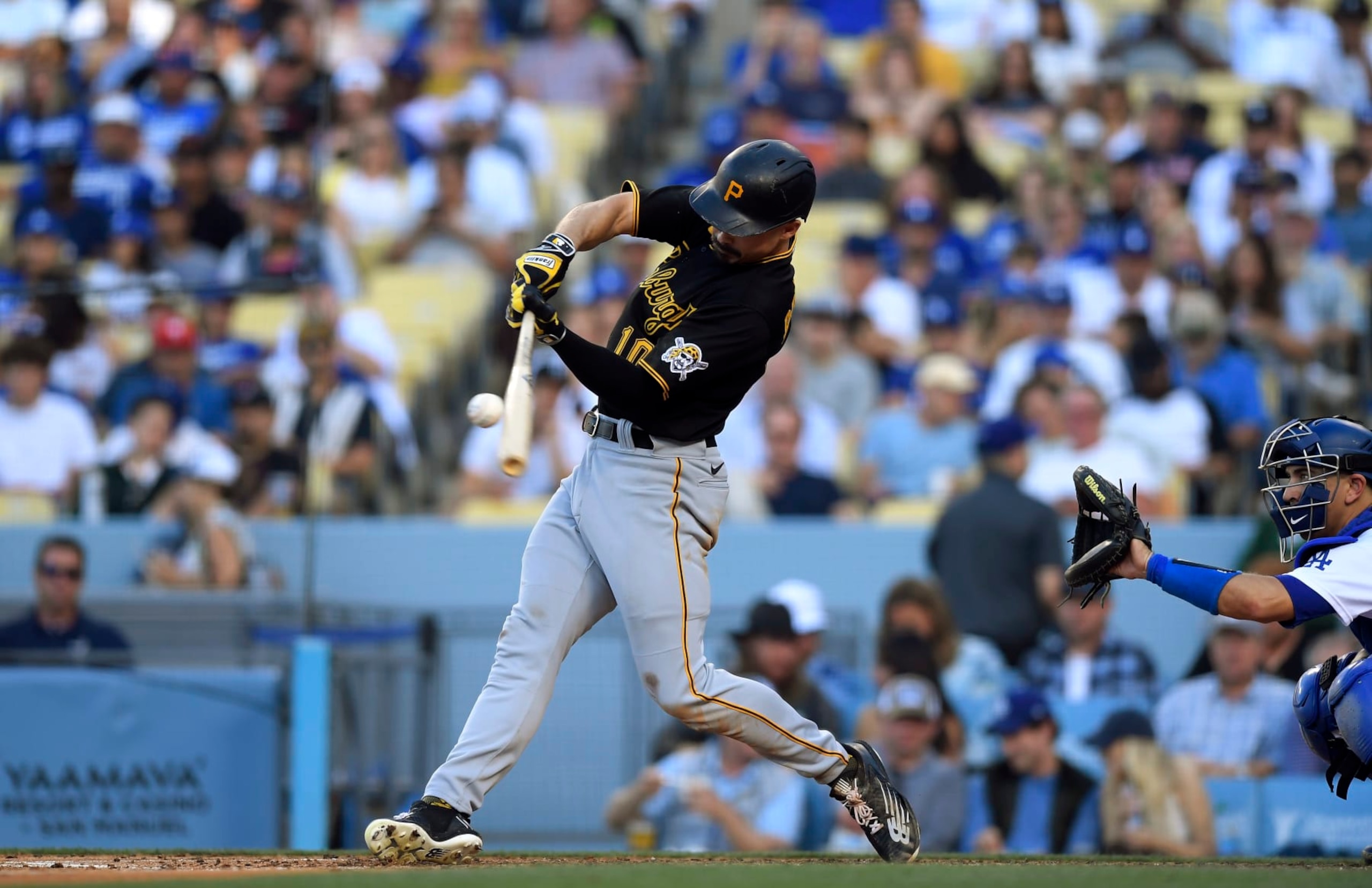 LOS ANGELES, CA - JUNE 01: Bryan Reynolds #10 of the Pittsburgh Pirates hits a two-run home run against starting pitcher Mitch White of the Los Angeles Dodgers in the fifth inning at Dodger Stadium on June 1, 2022 in Los Angeles, California. (Photo by Kevork Djansezian/Getty Images)