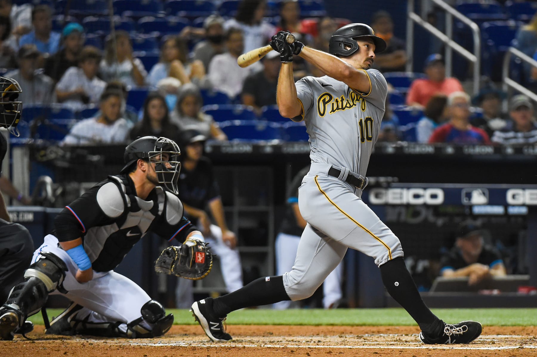 MIAMI, FLORIDA - SEPTEMBER 17:  Bryan Reynolds #10 of the Pittsburgh Pirates  hits a double in the third inning against the Miami Marlins at loanDepot park on September 17, 2021 in Miami, Florida.  (Photo by Eric Espada/Getty Images)