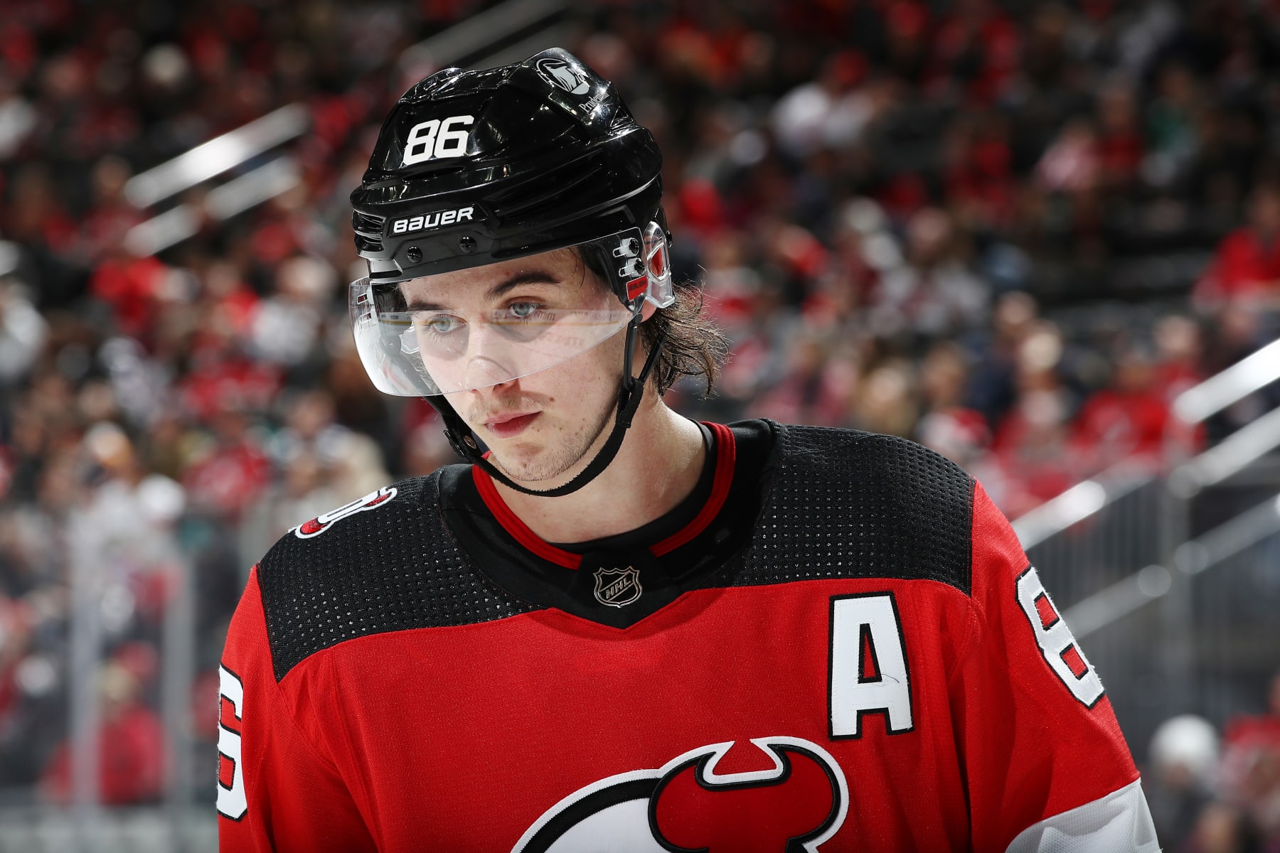 NEWARK, NEW JERSEY - DECEMBER 17: Jack Hughes #86 of the New Jersey Devils looks on during the second period against the Florida Panthers at Prudential Center on December 17, 2022 in Newark, New Jersey. (Photo by Sarah Stier/Getty Images)