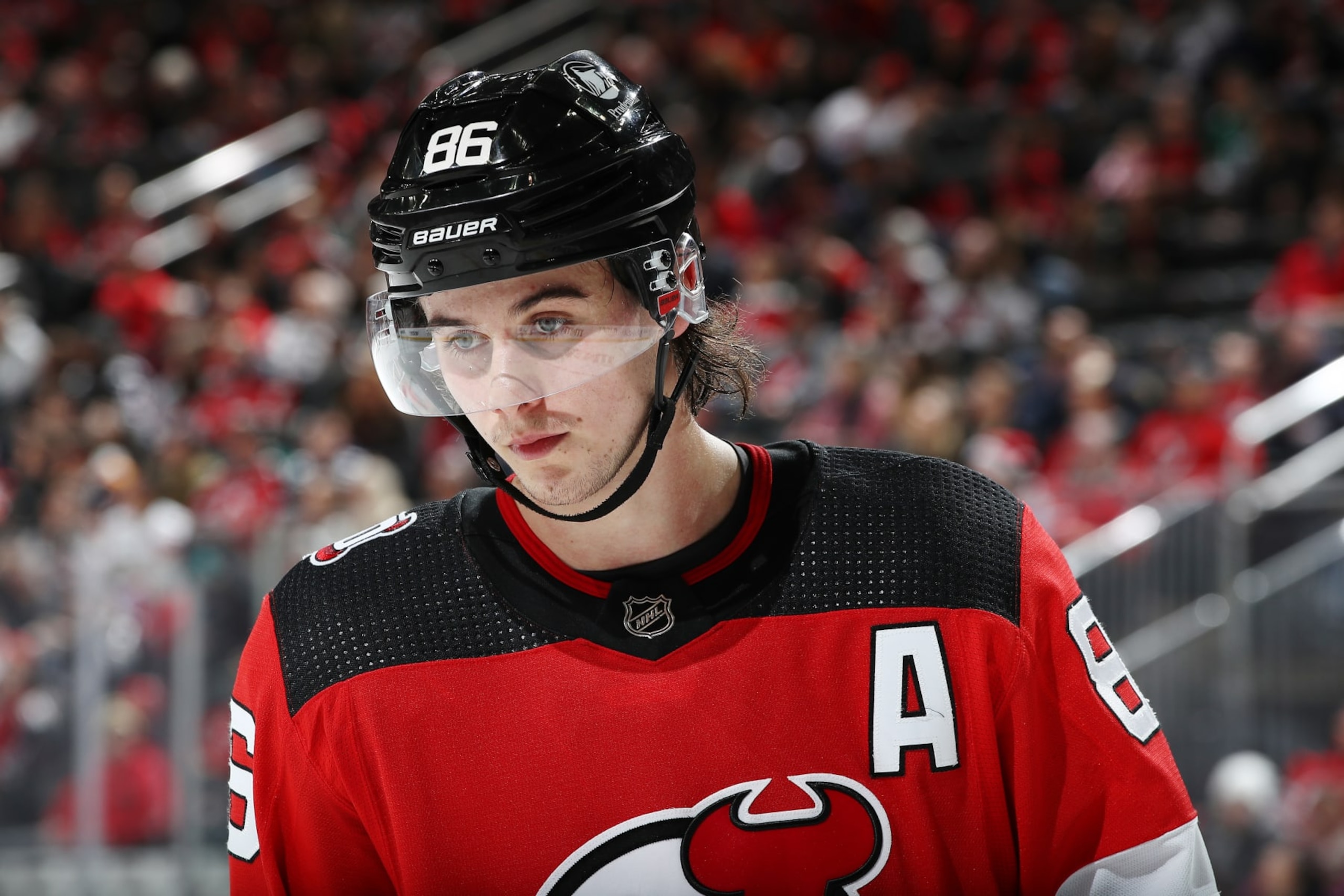 NEWARK, NEW JERSEY - DECEMBER 17: Jack Hughes #86 of the New Jersey Devils looks on during the second period against the Florida Panthers at Prudential Center on December 17, 2022 in Newark, New Jersey. (Photo by Sarah Stier/Getty Images)