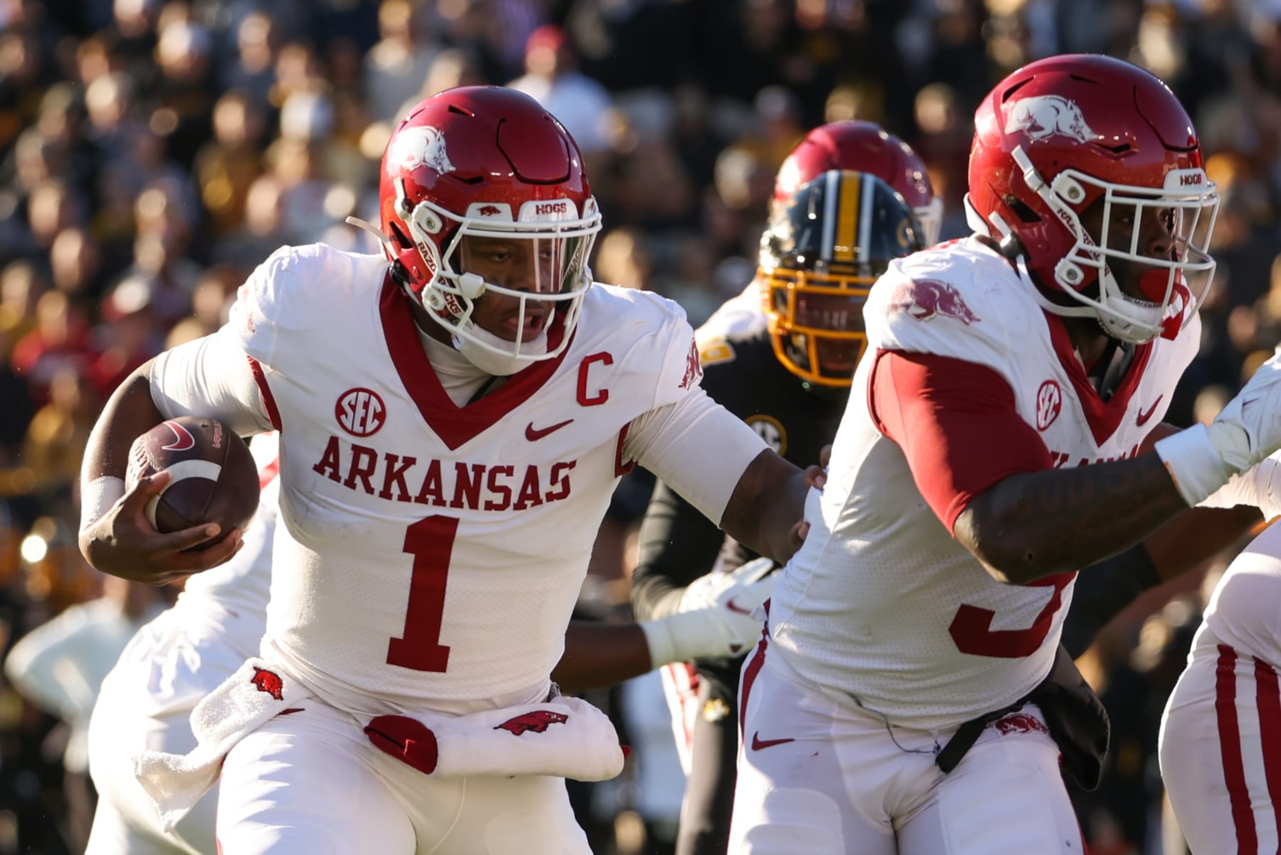 COLUMBIA, MO - NOVEMBER 25: Arkansas Razorbacks quarterback KJ Jefferson (1) follows his blockers during a run in the first quarter of an SEC college football game between the Arkansas Razorbacks and Missouri Tigers on November 25, 2022 at Memorial Stadium in Columbia, MO. (Photo by Scott Winters/Icon Sportswire via Getty Images) COLUMBIA, MO - NOVEMBER 25: Arkansas Razorbacks quarterback KJ Jefferson (1) follows his blockers during a run in the first quarter of an SEC college football game between the Arkansas Razorbacks and Missouri Tigers on November 25, 2022 at Memorial Stadium in Columbia, MO. (Photo by Scott Winters/Icon Sportswire via Getty Images)