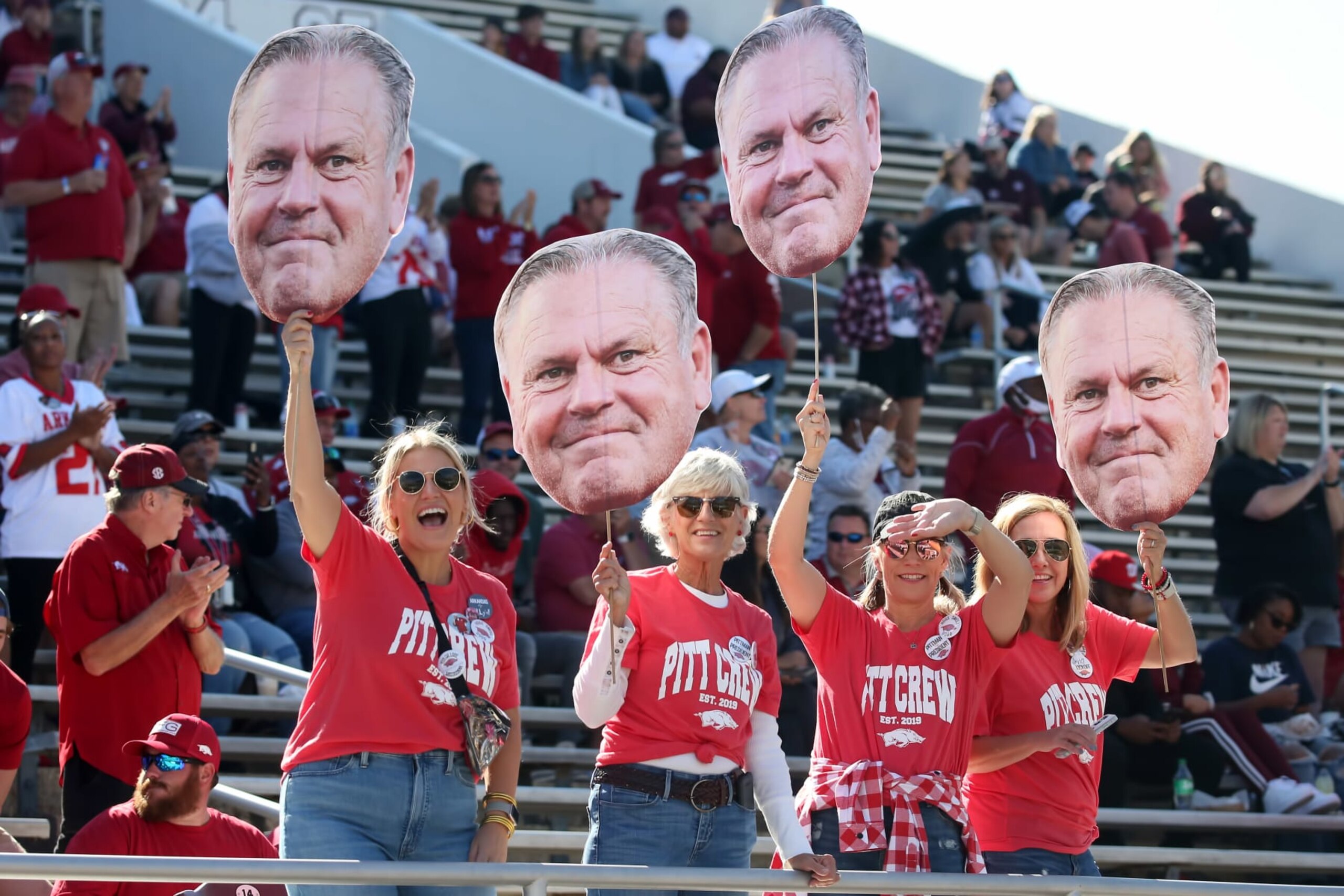 STARKVILLE, MS - OCTOBER 08: Arkansas Razorbacks fans hold up face cut outs of Arkansas Razorbacks head coach Sam Pittman before the game between the Mississippi State Bulldogs and the Arkansas Razorbacks on October 8, 2022 at Wade Davis Stadium in Starkville, Mississippi. (Photo by Michael Wade/Icon Sportswire via Getty Images) STARKVILLE, MS - OCTOBER 08: Arkansas Razorbacks fans hold up face cut outs of Arkansas Razorbacks head coach Sam Pittman before the game between the Mississippi State Bulldogs and the Arkansas Razorbacks on October 8, 2022 at Wade Davis Stadium in Starkville, Mississippi. (Photo by Michael Wade/Icon Sportswire via Getty Images)