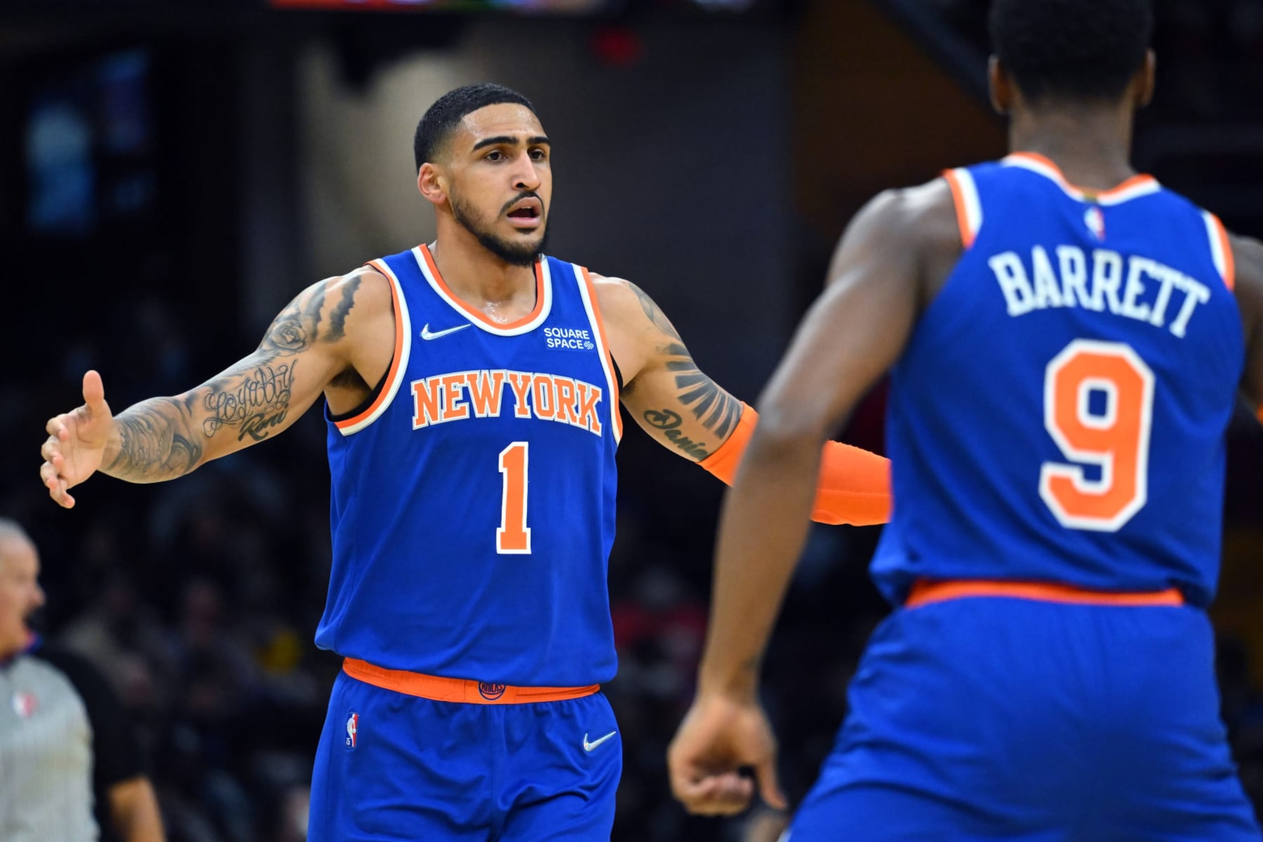 CLEVELAND, OHIO - JANUARY 24: Obi Toppin #1 celebrates with RJ Barrett #9 of the New York Knicks during the second half against the Cleveland Cavaliers at Rocket Mortgage Fieldhouse on January 24, 2022 in Cleveland, Ohio. The Cavaliers defeated the Knicks 95-93. NOTE TO USER: User expressly acknowledges and agrees that, by downloading and/or using this photograph, user is consenting to the terms and conditions of the Getty Images License Agreement. (Photo by Jason Miller/Getty Images)