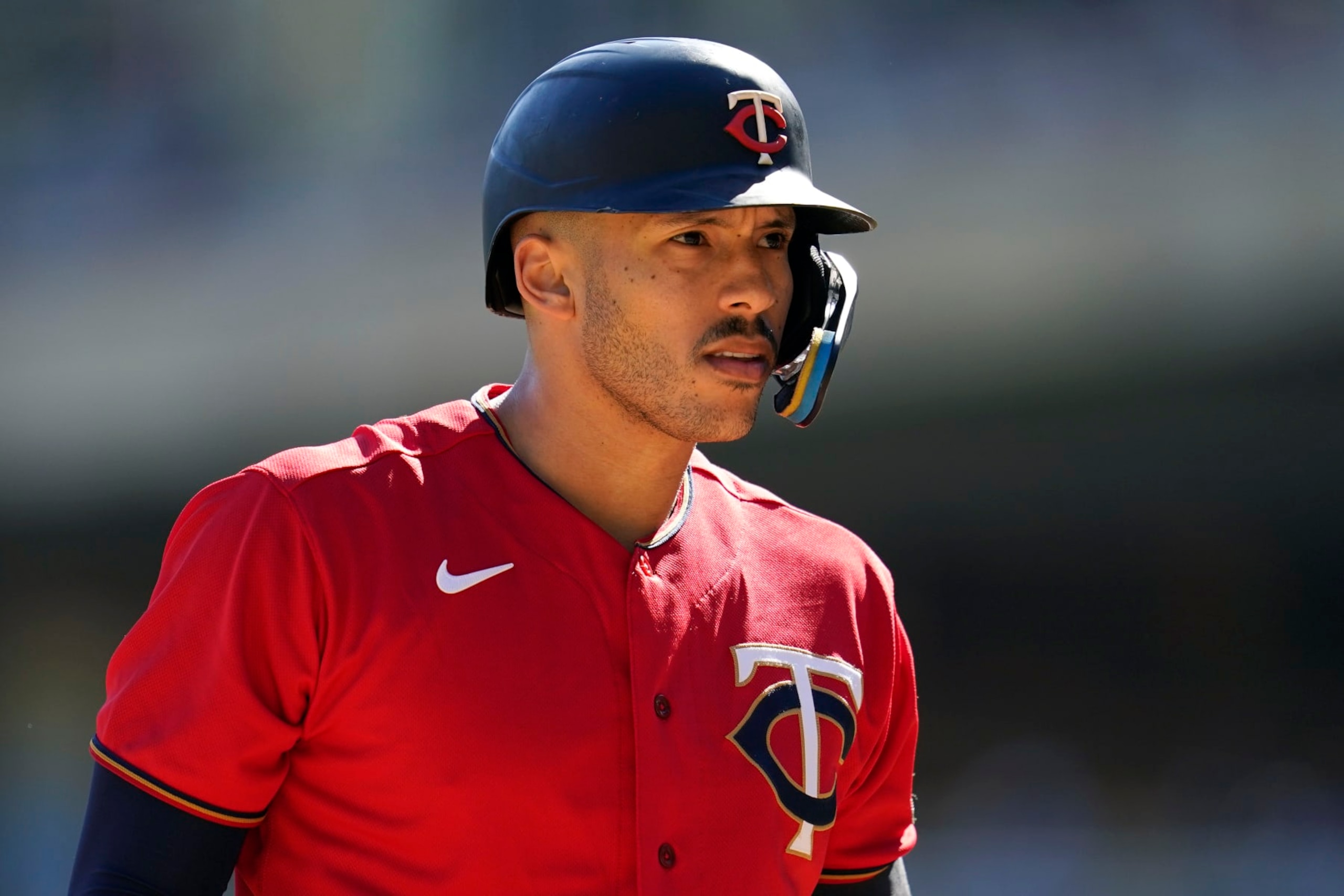 Minnesota Twins' Carlos Correa reacts while batting during the first inning of a baseball game against the Chicago White Sox, Thursday, Sept. 29, 2022, in Minneapolis. (AP Photo/Abbie Parr)