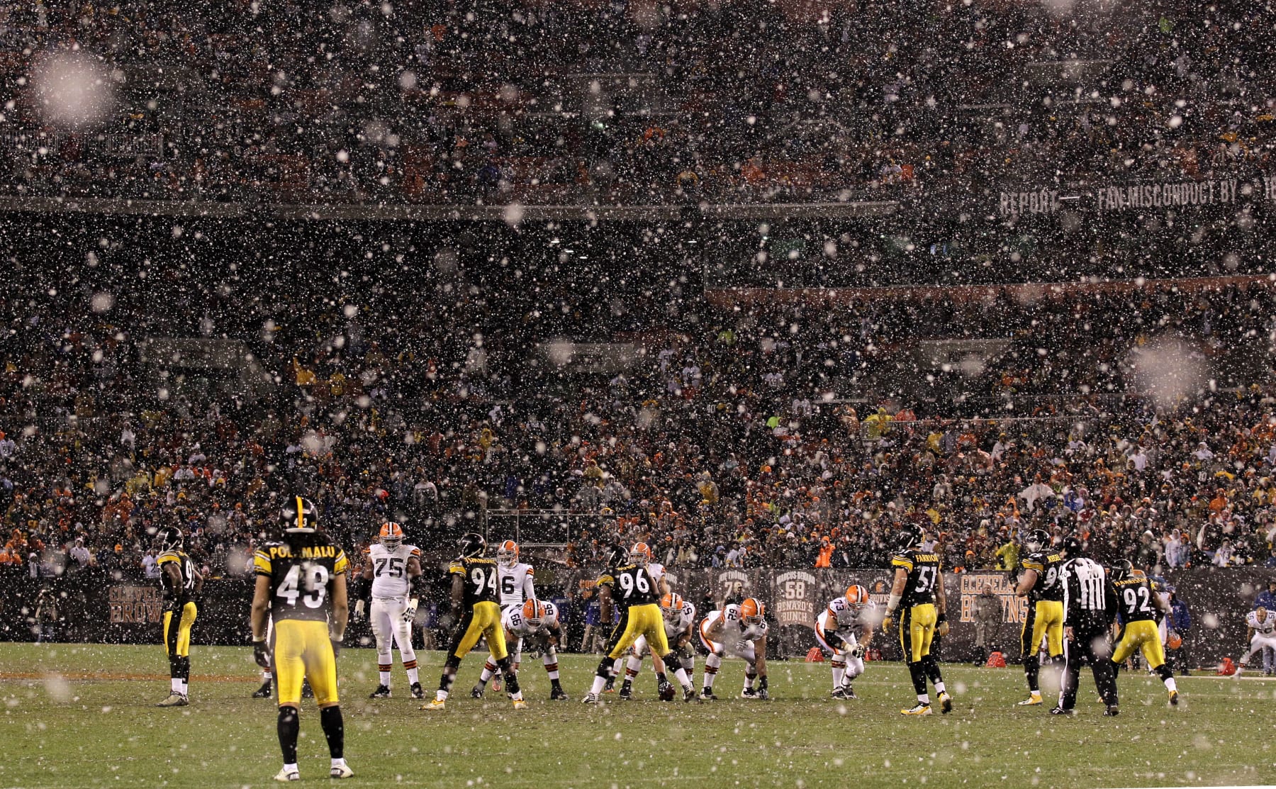 As the snow falls, the Cleveland Browns line up on offense against the Pittsburgh Steelers late in the fourth quarter of their NFL football game on Sunday, Jan. 1, 2012, in Cleveland. The Steelers won the game 13-9. (AP Photo/Amy Sancetta)