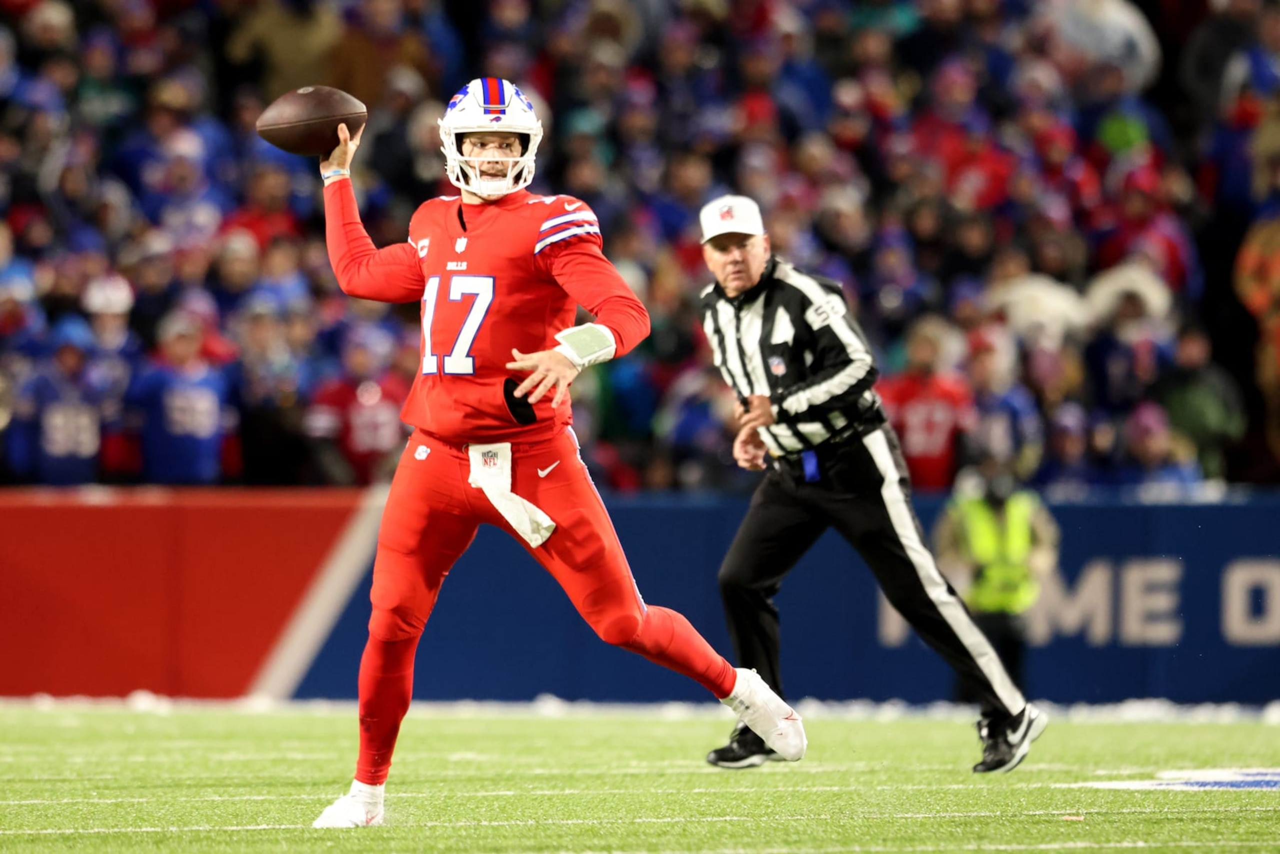 ORCHARD PARK, NEW YORK - DECEMBER 17: Josh Allen #17 of the Buffalo Bills passes during the third quarter against the Miami Dolphins at Highmark Stadium on December 17, 2022 in Orchard Park, New York. (Photo by Bryan M. Bennett/Getty Images)