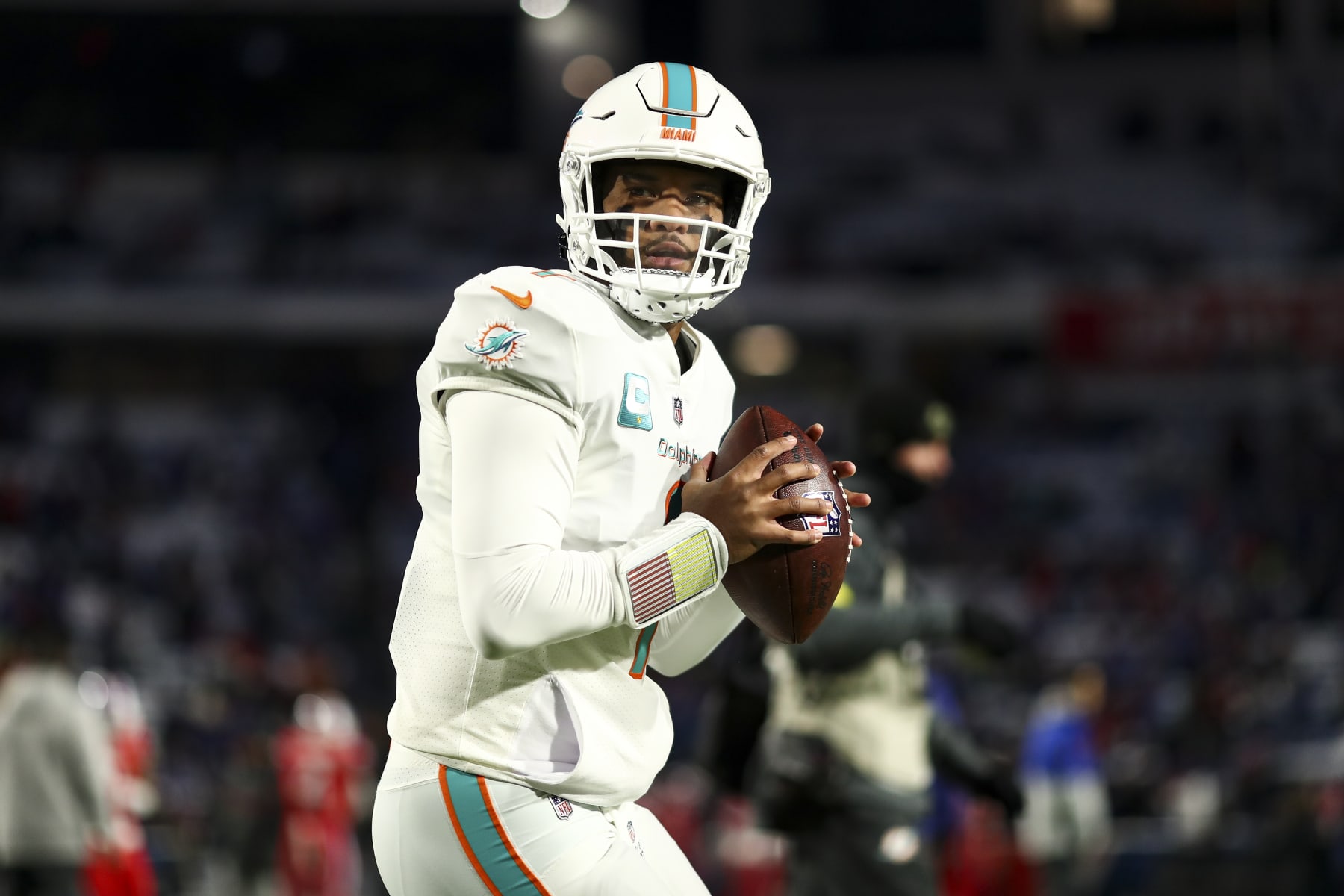 ORCHARD PARK, NY - DECEMBER 17: Tua Tagovailoa #1 of the Miami Dolphins warms up prior to an NFL football game against the Buffalo Bills at Highmark Stadium on December 17, 2022 in Orchard Park, New York. (Photo by Kevin Sabitus/Getty Images)