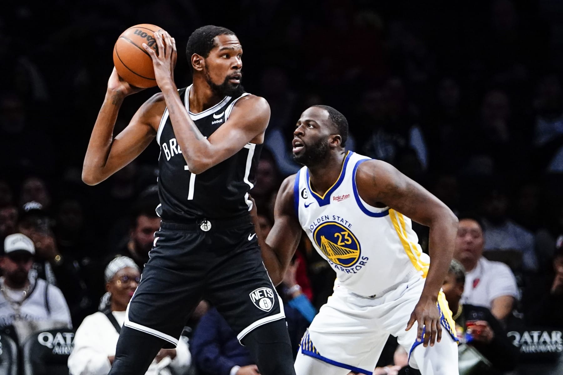 Golden State Warriors' James Wiseman (33) defends Brooklyn Nets' Kevin Durant (7) during the first half of an NBA basketball game Wednesday, Dec. 21, 2022 in New York. (AP Photo/Frank Franklin II)