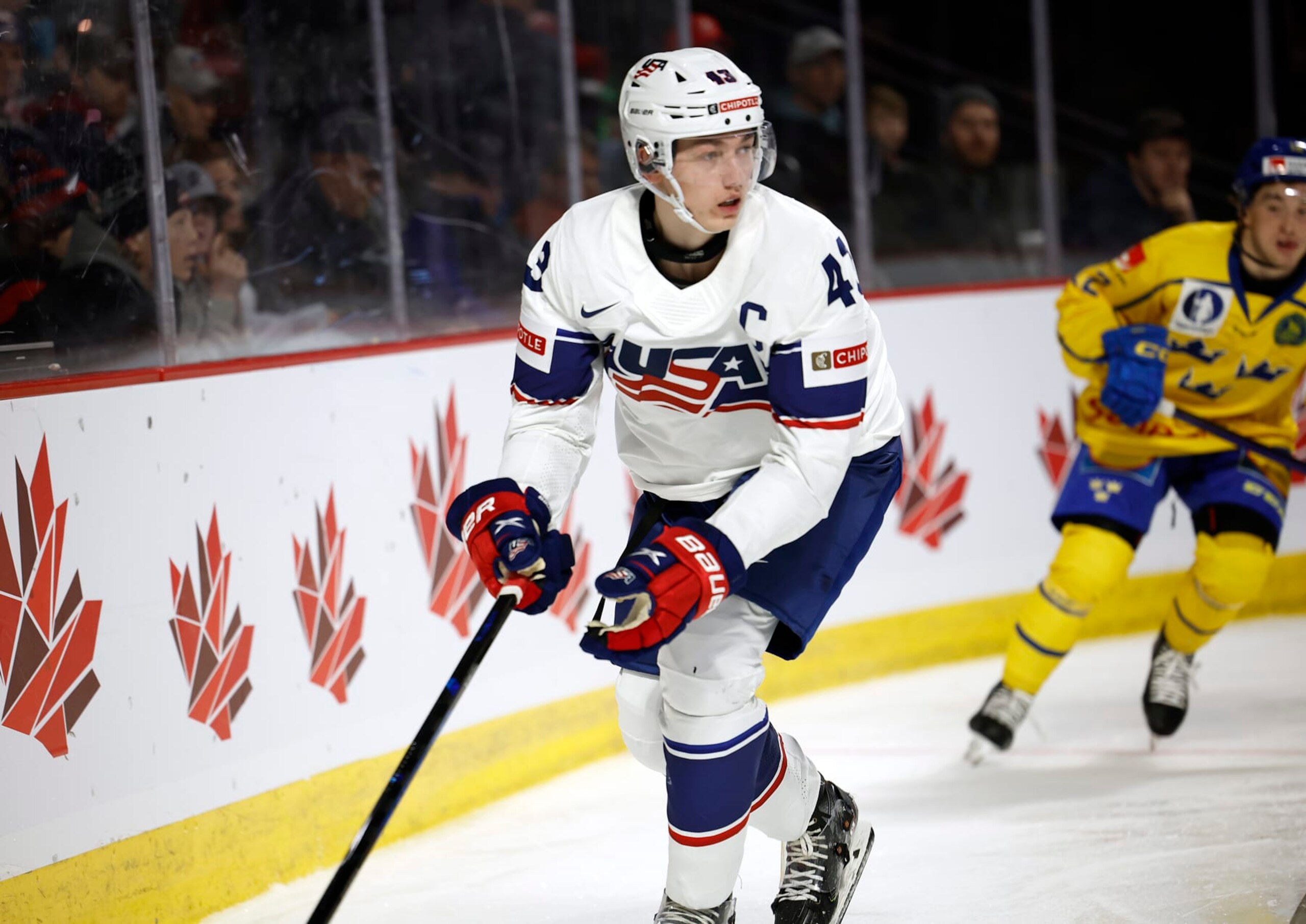 MONCTON, NB - DECEMBER 21: Luke Hughes#43 for Team USA skates puck from back of net against team Sweden in the third period during the 2023 IIHF World Junior Championship game at Avenir Centre on December 21, 2022 in Moncton, Canada. (Photo by Dale Preston/Getty Images)