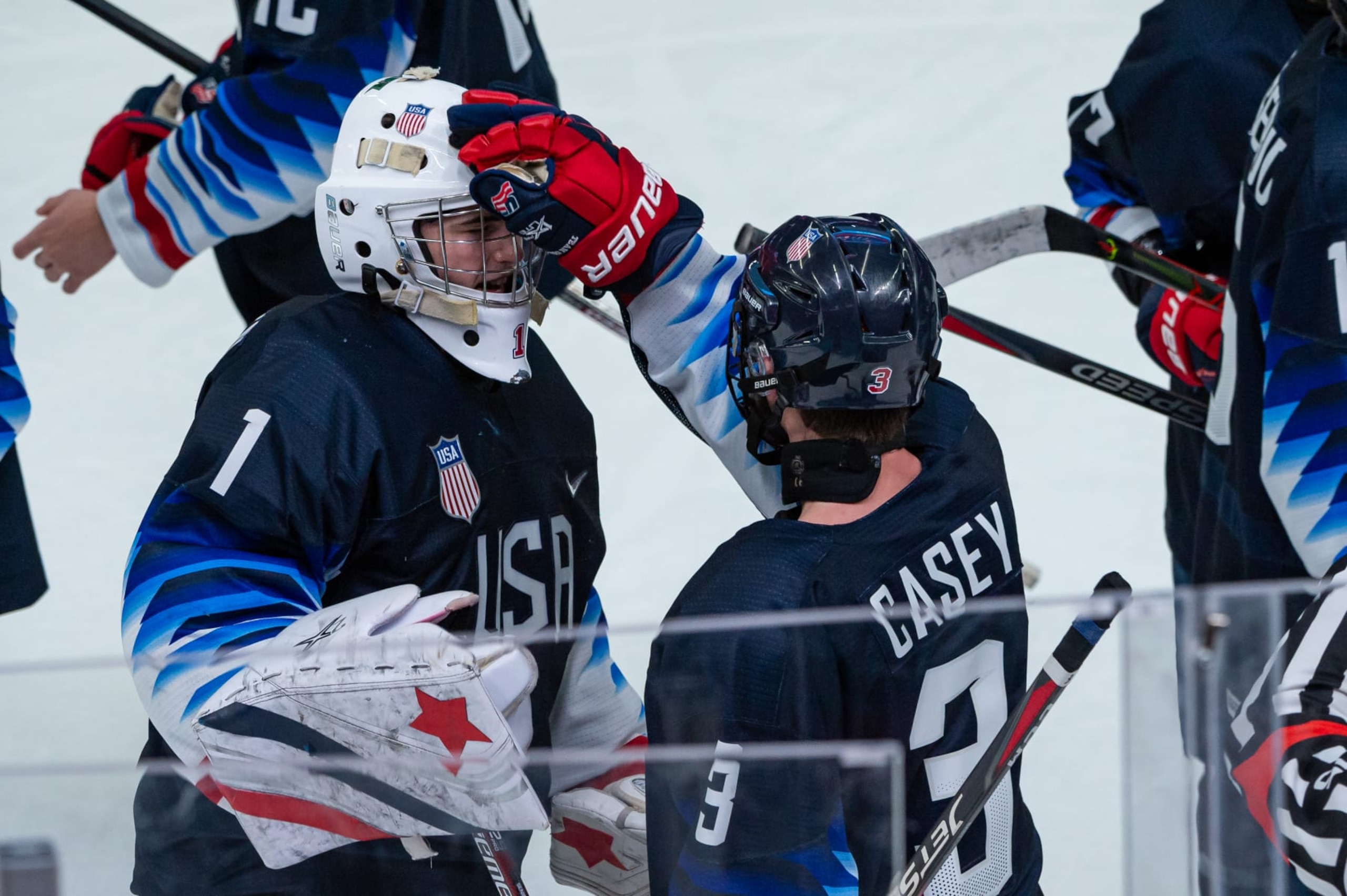 LAUSANNE, SWITZERLAND - JANUARY 21: Dylan Silverstein and #3 Seamus Casey of United States celebrates the win after\ Men's 6-Team Tournament Semifinals Game between United States and Canada of the Lausanne 2020 Winter Youth Olympics on January 21, 2020 in Lausanne, Switzerland. (Photo by RvS.Media/Robert Hradil/Getty Images)