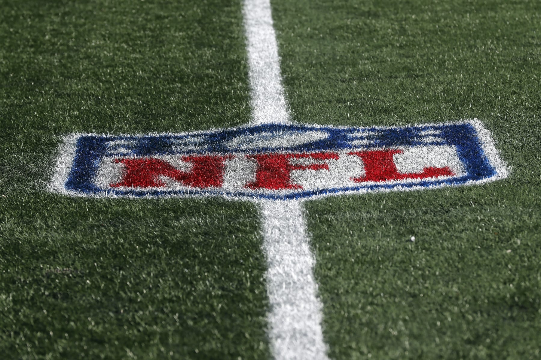NFL Football logo on the field before a game between the New England Patriots and the New York Jets, Sunday, Nov. 20, 2022, in Foxborough, Mass. (AP Photo/Michael Dwyer)