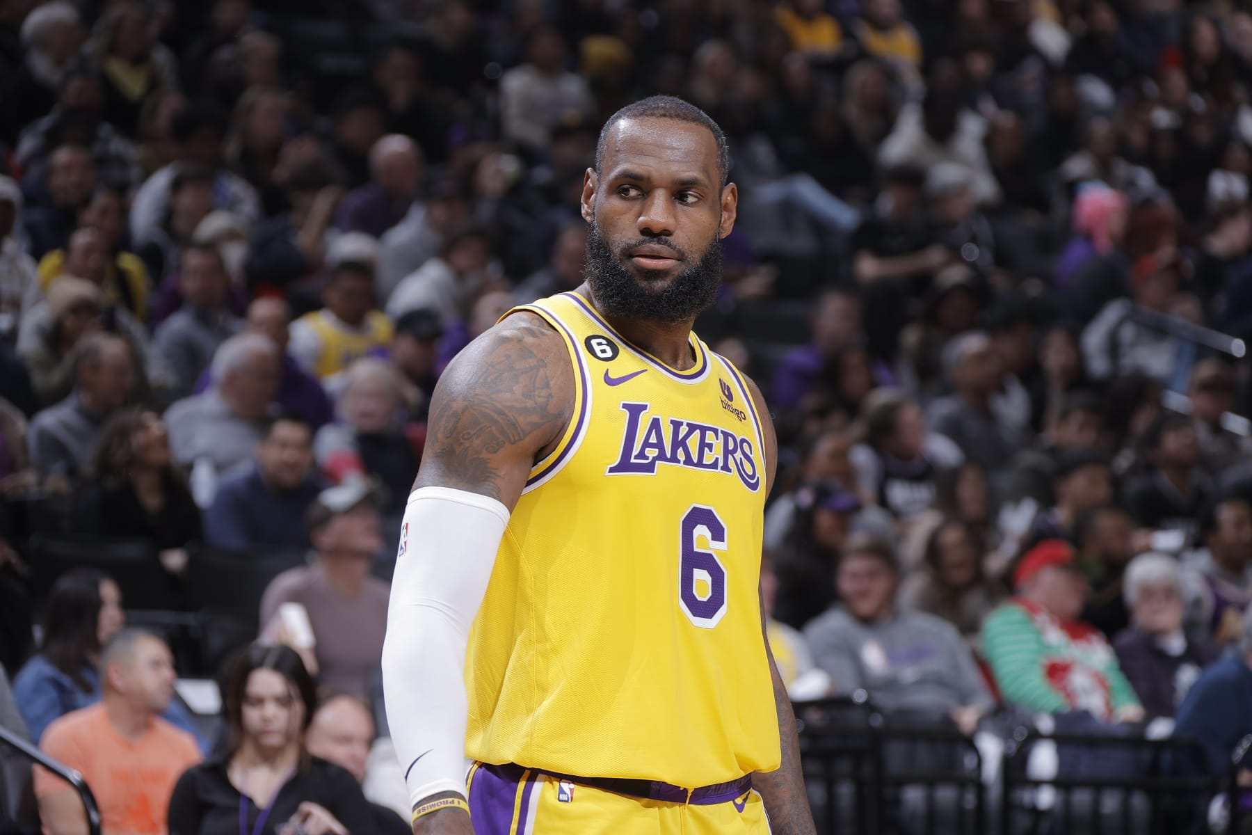 SACRAMENTO, CA - DECEMBER 21: LeBron James #6 of the Los Angeles Lakers looks on during the game against the Sacramento Kings on December 21, 2022 at Golden 1 Center in Sacramento, California. NOTE TO USER: User expressly acknowledges and agrees that, by downloading and or using this Photograph, user is consenting to the terms and conditions of the Getty Images License Agreement. Mandatory Copyright Notice: Copyright 2022 NBAE (Photo by Rocky Widner/NBAE via Getty Images)