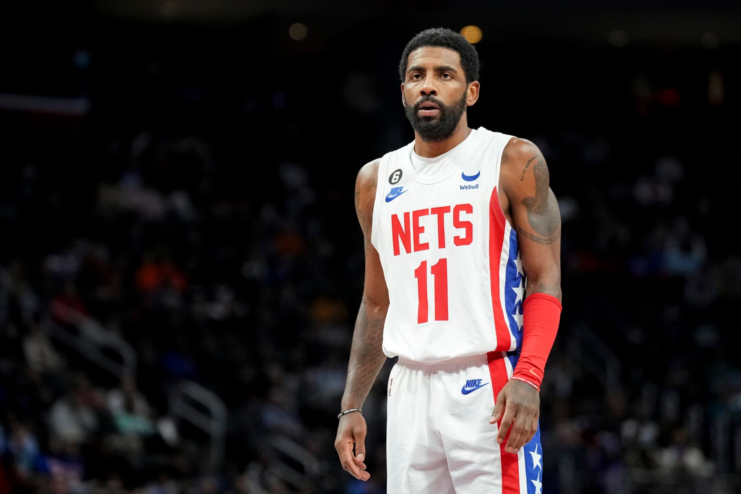 DETROIT, MICHIGAN - DECEMBER 18: Kyrie Irving #11 of the Brooklyn Nets looks to shoot a free throw against the Detroit Pistons at Little Caesars Arena on December 18, 2022 in Detroit, Michigan. NOTE TO USER: User expressly acknowledges and agrees that, by downloading and or using this photograph, User is consenting to the terms and conditions of the Getty Images License Agreement. (Photo by Nic Antaya/Getty Images)