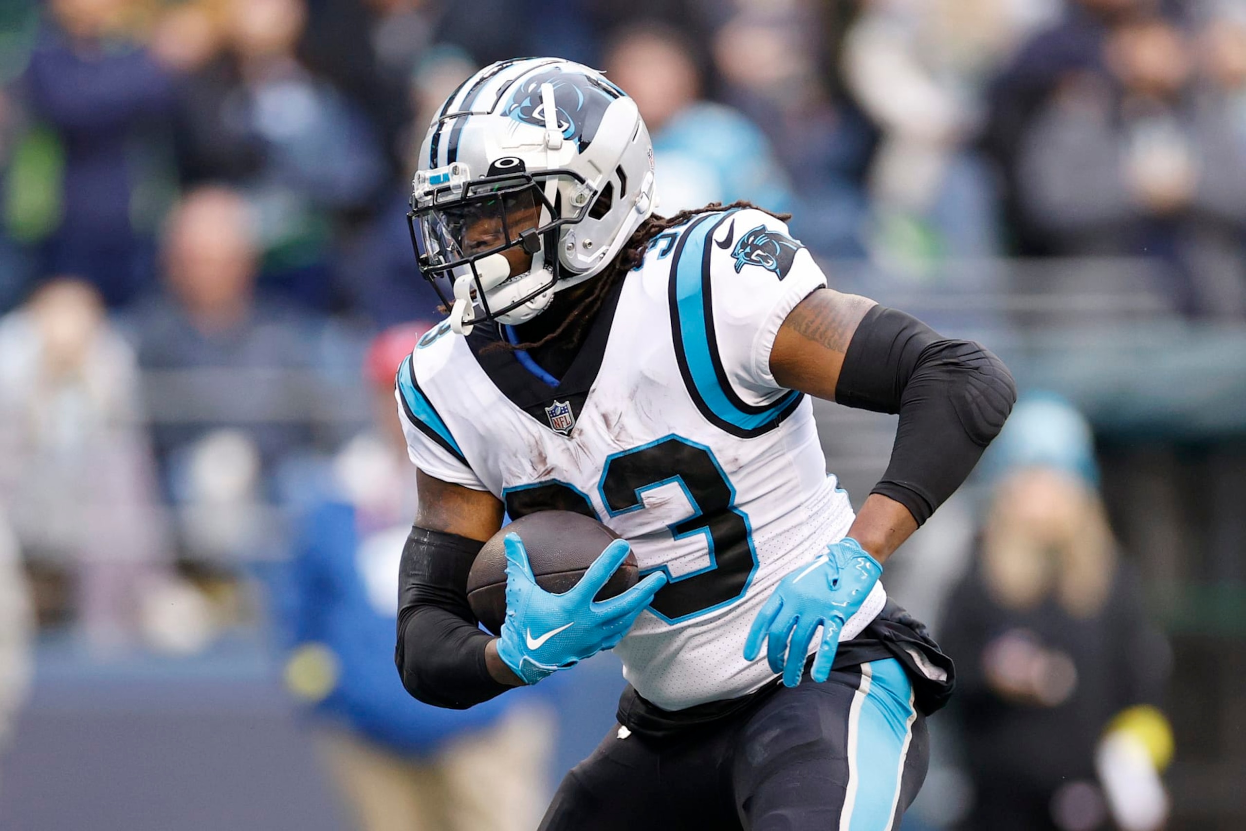 SEATTLE, WASHINGTON - DECEMBER 11: D'Onta Foreman #33 of the Carolina Panthers carries the ball during the second quarter against the Seattle Seahawks at Lumen Field on December 11, 2022 in Seattle, Washington. (Photo by Steph Chambers/Getty Images)