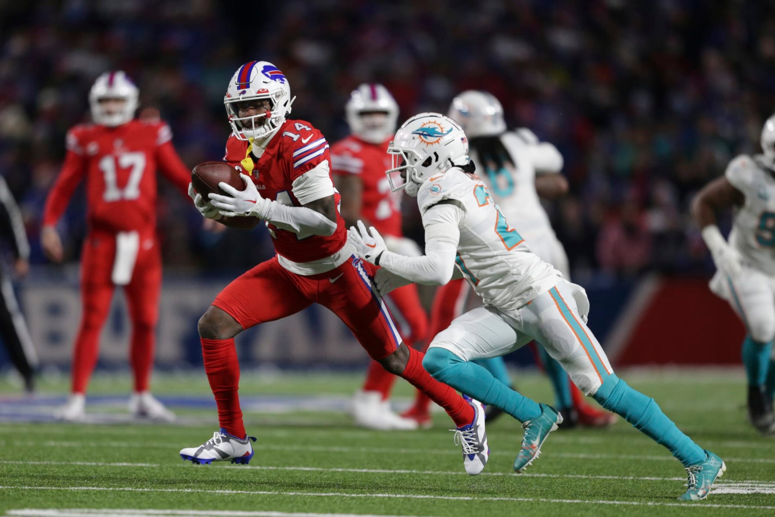 Buffalo Bills wide receiver Stefon Diggs (14) runs after a catch during the first half of an NFL football game against the Miami Dolphins on Saturday, Dec. 17, 2022, in Orchard Park, N.Y. (AP Photo/Joshua Bessex)