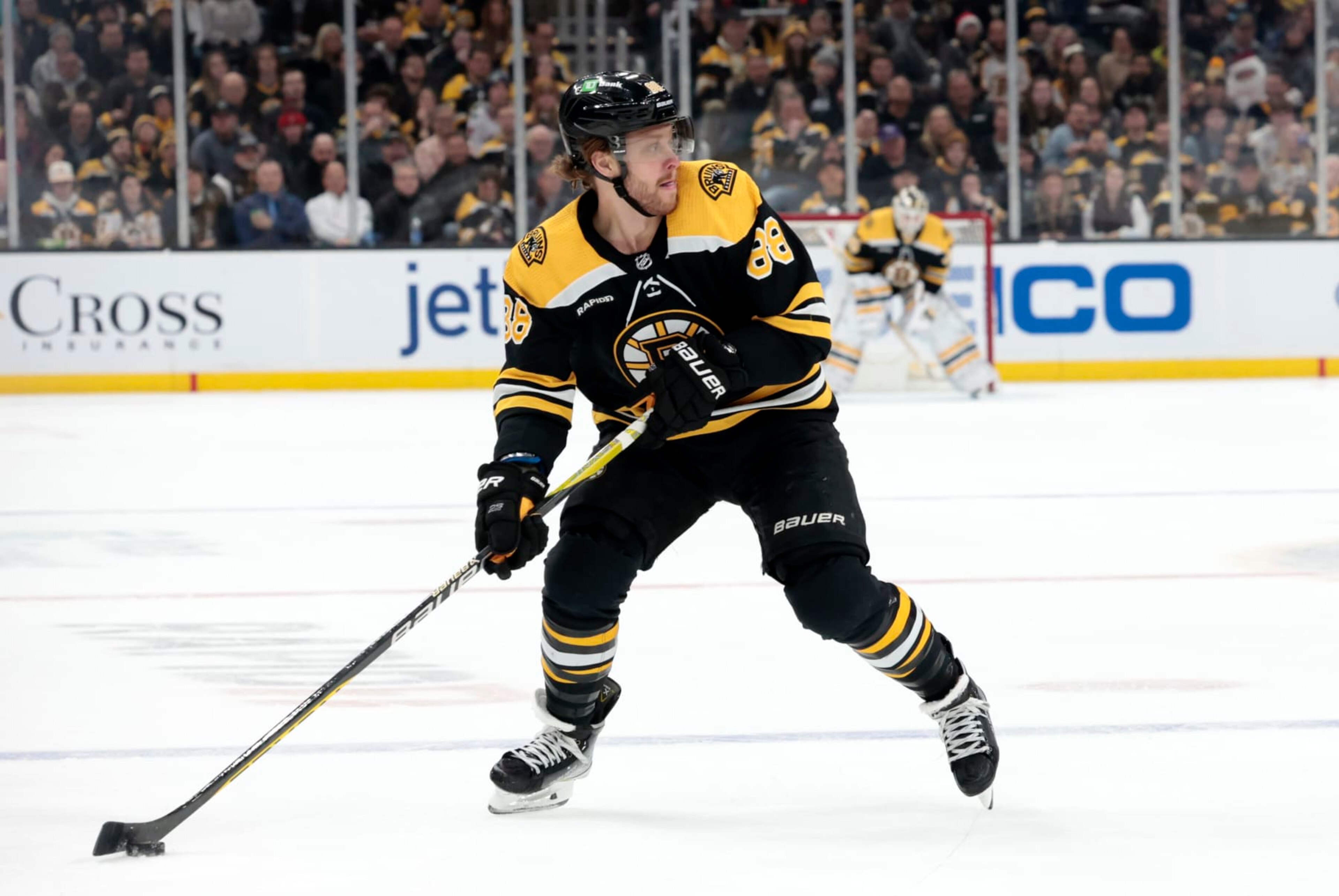 BOSTON, MA - DECEMBER 19: Boston Bruins right wing David Pastrnak (88) holds the puck on the power play during a game between the Boston Bruins and the Florida Panthers on December 19, 2022, at TD Garden in Boston, Massachusetts. (Photo by Fred Kfoury III/Icon Sportswire via Getty Images) BOSTON, MA - DECEMBER 19: Boston Bruins right wing David Pastrnak (88) holds the puck on the power play during a game between the Boston Bruins and the Florida Panthers on December 19, 2022, at TD Garden in Boston, Massachusetts. (Photo by Fred Kfoury III/Icon Sportswire via Getty Images)