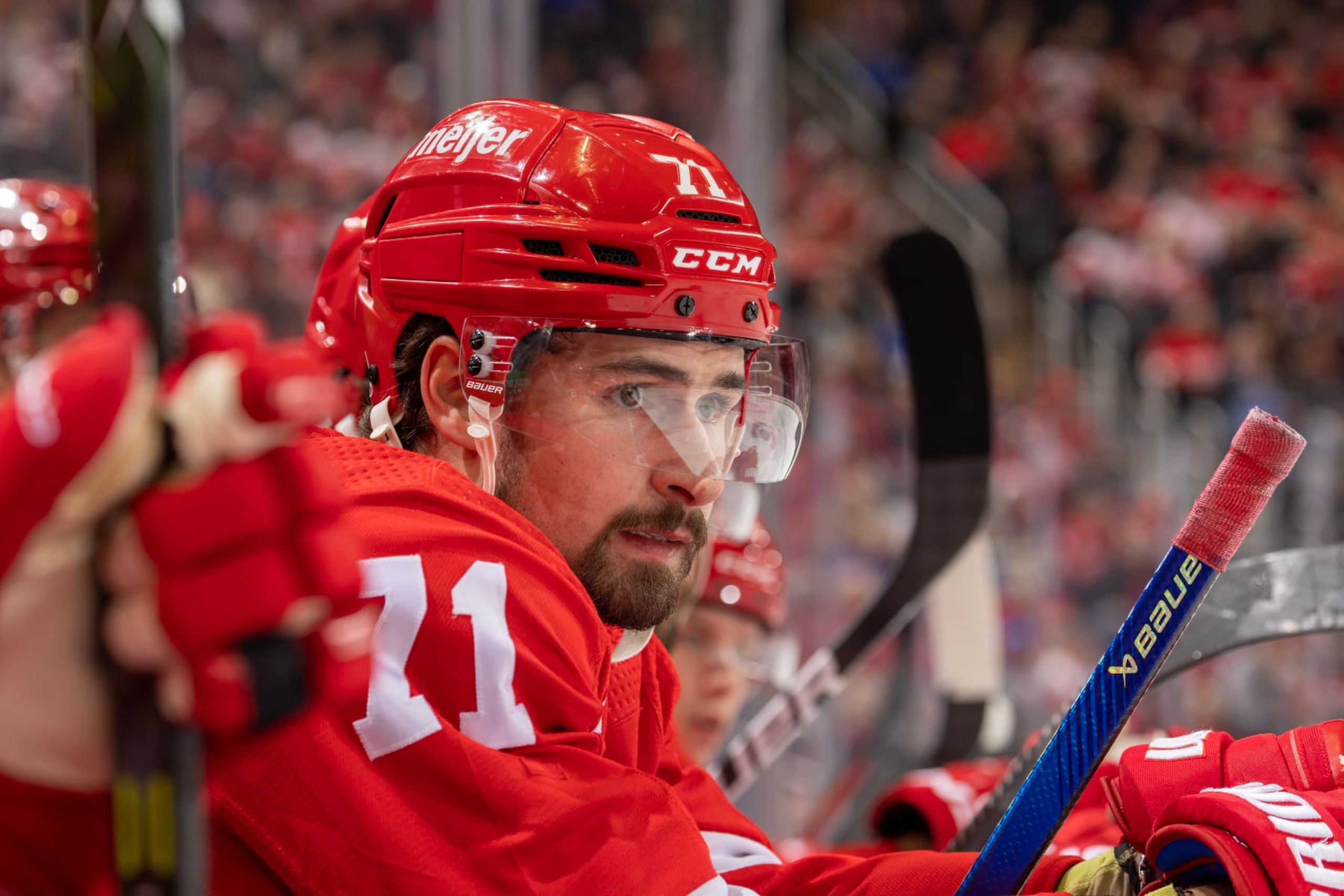 DETROIT, MI - DECEMBER 21: Dylan Larkin #71 of the Detroit Red Wings watches the action from the bench against the Tampa Bay Lightning during the first period of an NHL game at Little Caesars Arena on December 21, 2022 in Detroit, Michigan. (Photo by Dave Reginek/NHLI via Getty Images)