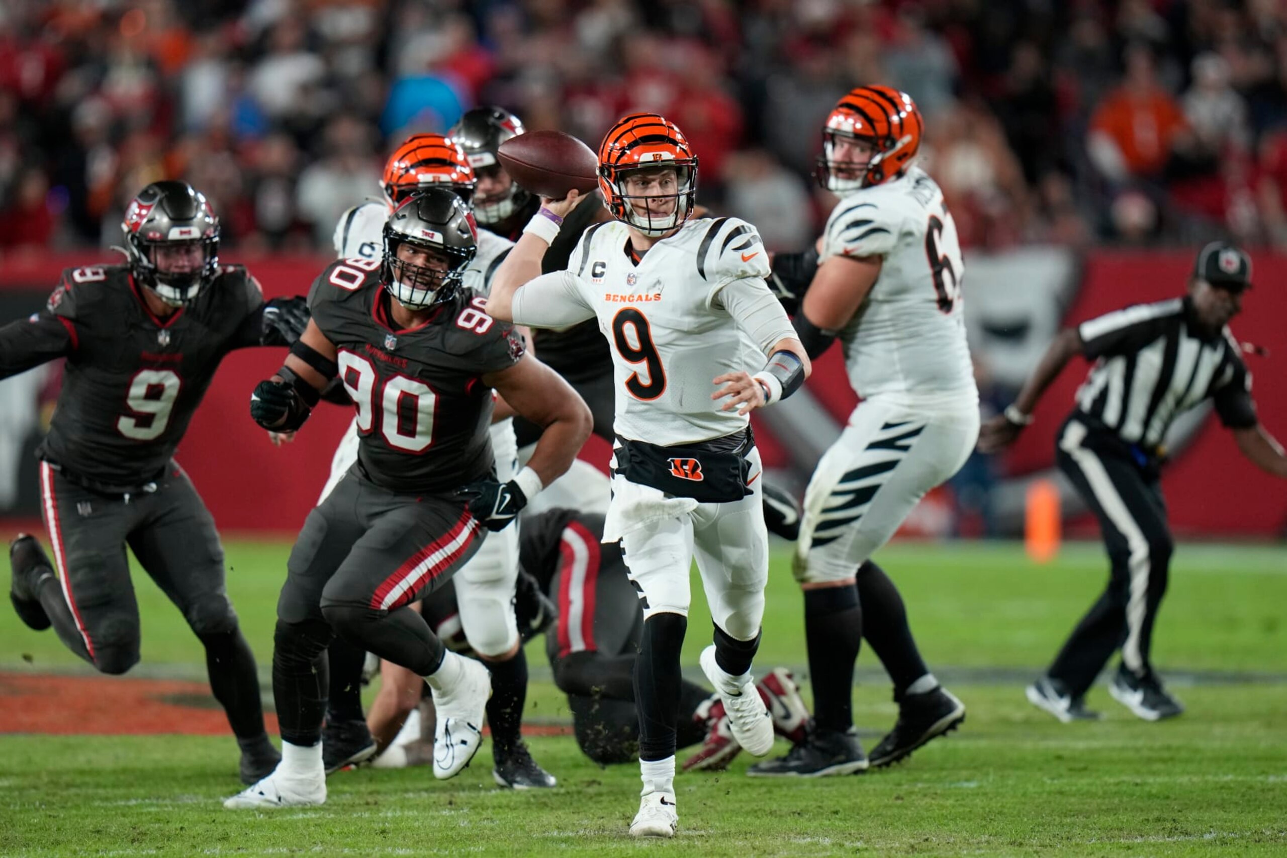 Cincinnati Bengals quarterback Joe Burrow (9) throws a pass against the Tampa Bay Buccaneers during the second half of an NFL football game Sunday, Dec. 18, 2022, in Tampa, Fla. (AP Photo/Chris O'Meara)