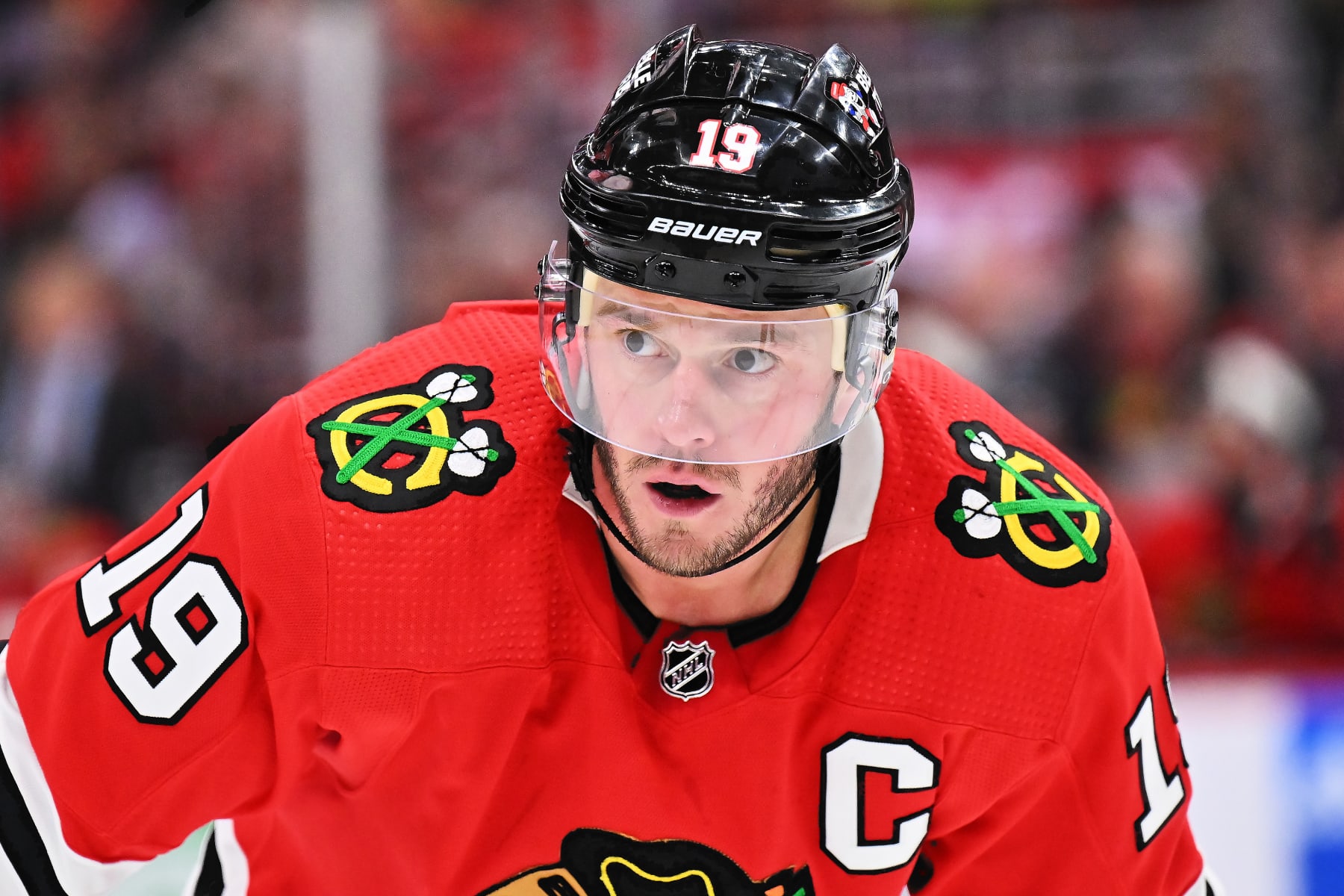 CHICAGO, ILLINOIS - DECEMBER 09:  Jonathan Toews #19 of the Chicago Blackhawks skates against the Winnipeg Jets on December 09, 2022 at United Center in Chicago, Illinois.  (Photo by Jamie Sabau/Getty Images)
