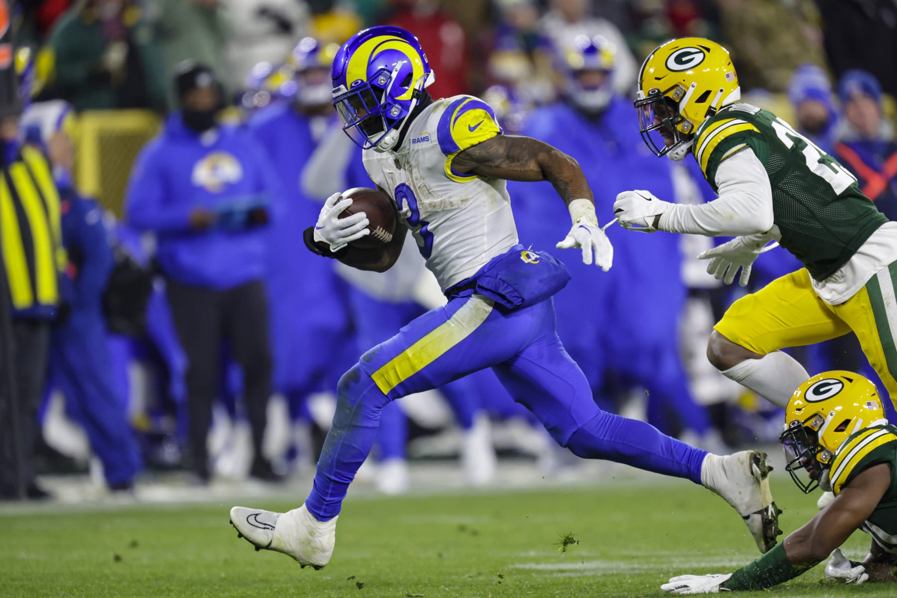 Los Angeles Rams running back Cam Akers (3) runs against the Green Bay Packers in the second half of an NFL football game in Green Bay, Wis. Monday, Dec. 19, 2022. (AP Photo/Matt Ludtke)