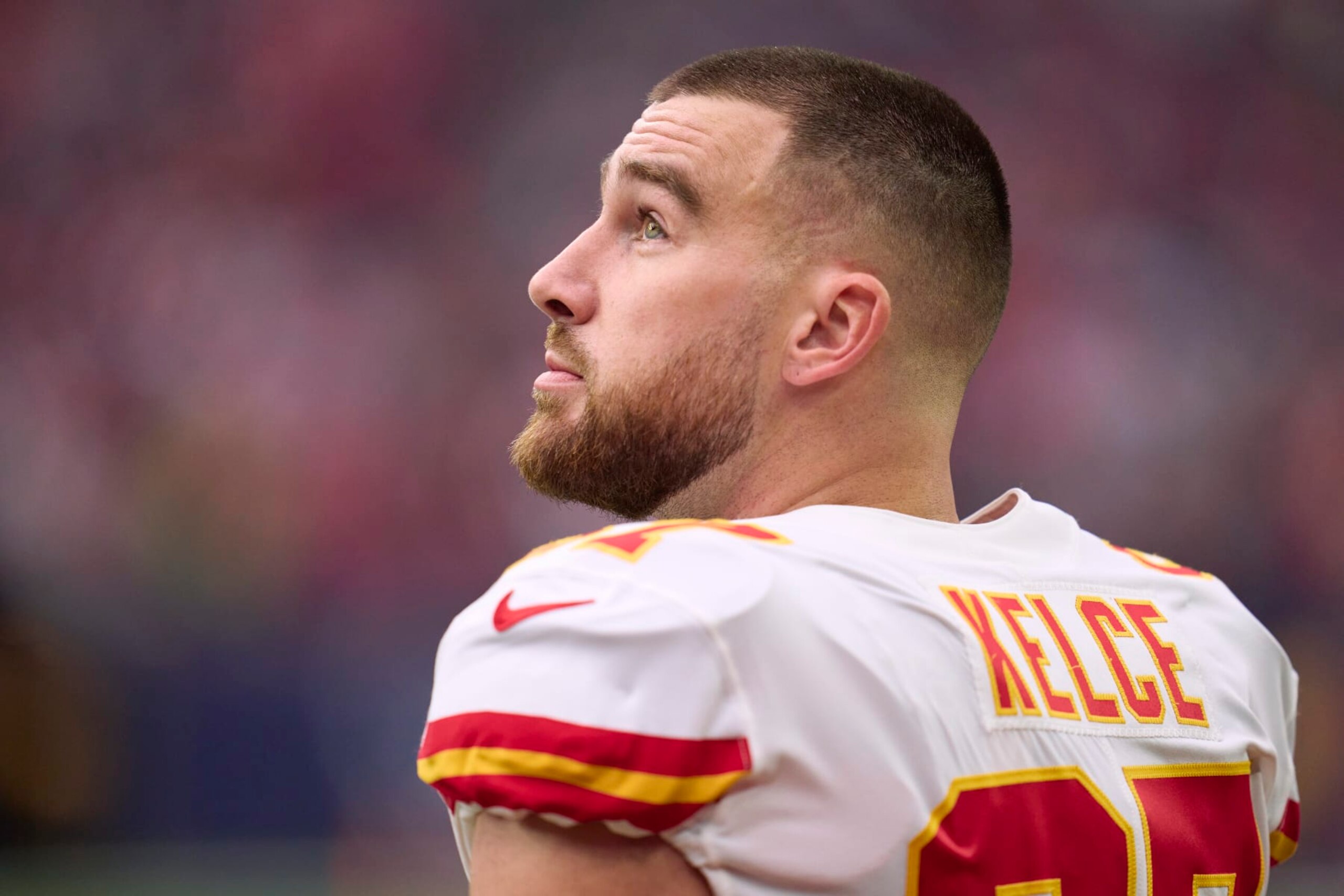 HOUSTON, TX - DECEMBER 18: Travis Kelce #87 of the Kansas City Chiefs looks on against the Houston Texans during the first half at NRG Stadium on December 18, 2022 in Houston, Texas. (Photo by Cooper Neill/Getty Images)