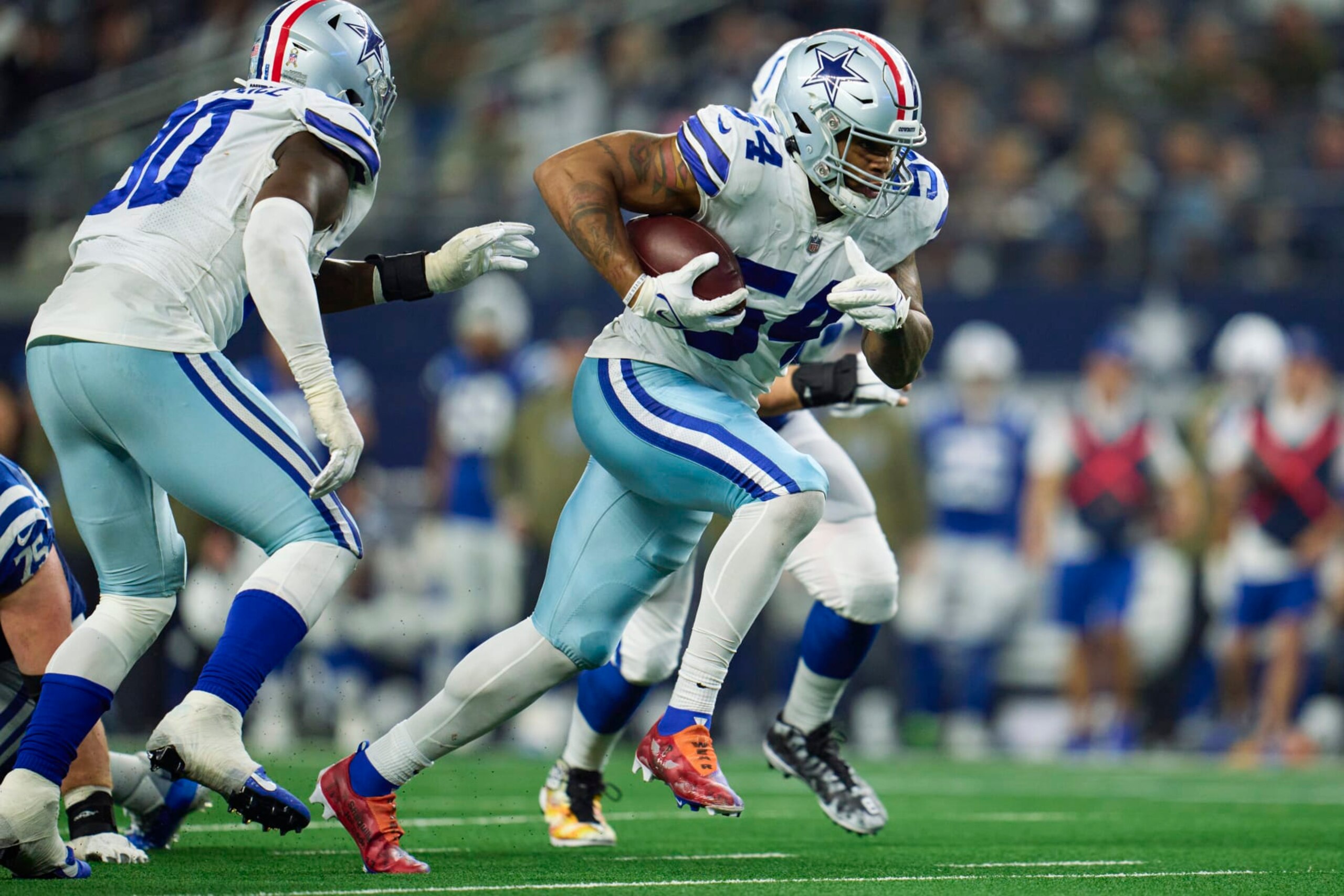 ARLINGTON, TX - DECEMBER 04: Sam Williams #54 of the Dallas Cowboys recovers a fumble against the Indianapolis Colts during the second half at AT&T Stadium on December 4, 2022 in Arlington, Texas. (Photo by Cooper Neill/Getty Images)
