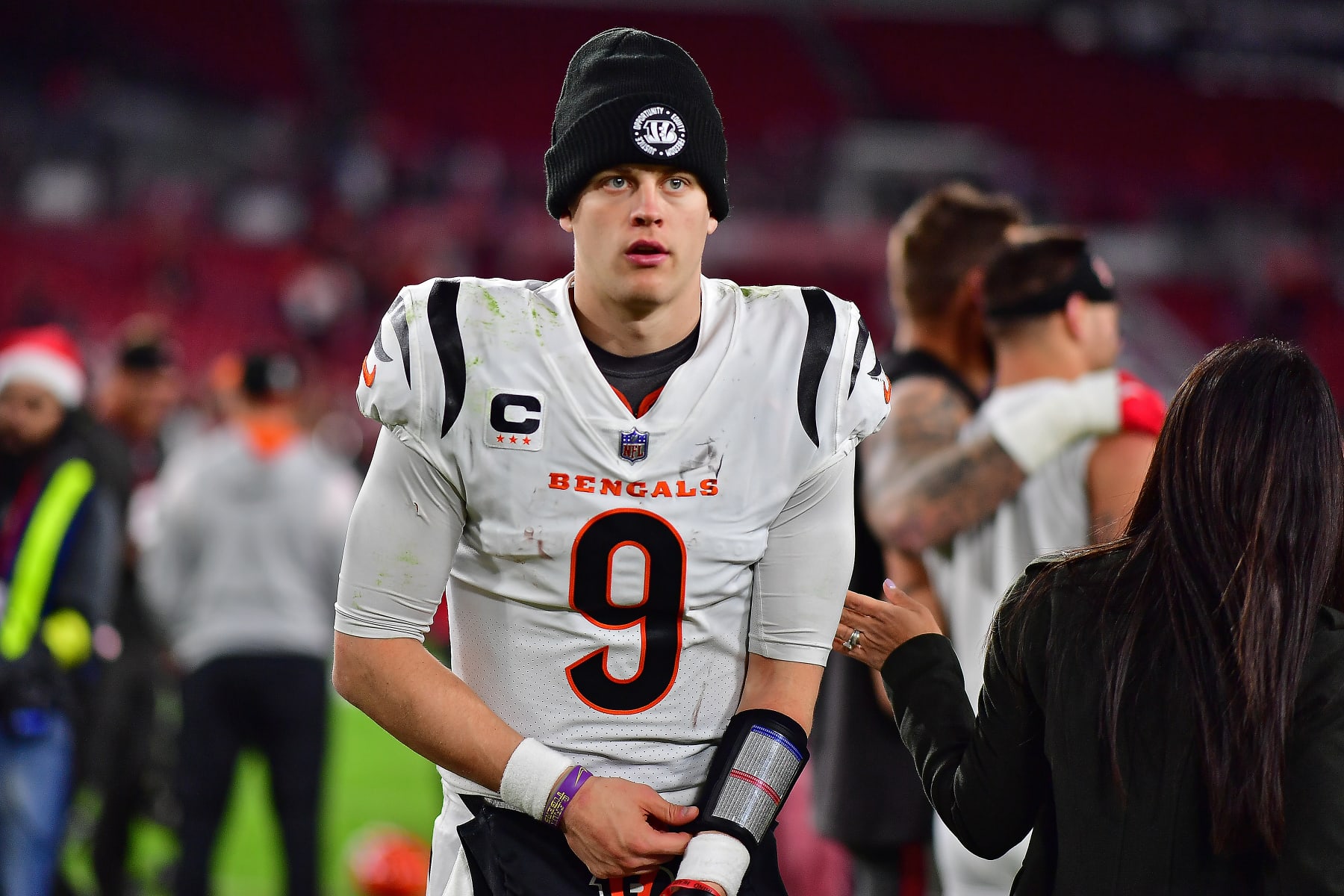 TAMPA, FLORIDA - DECEMBER 18: Joe Burrow #9 of the Cincinnati Bengals on the field after a win over the Tampa Bay Buccaneers at Raymond James Stadium on December 18, 2022 in Tampa, Florida. (Photo by Julio Aguilar/Getty Images) TAMPA, FLORIDA - DECEMBER 18: Joe Burrow #9 of the Cincinnati Bengals on the field after a win over the Tampa Bay Buccaneers at Raymond James Stadium on December 18, 2022 in Tampa, Florida. (Photo by Julio Aguilar/Getty Images)