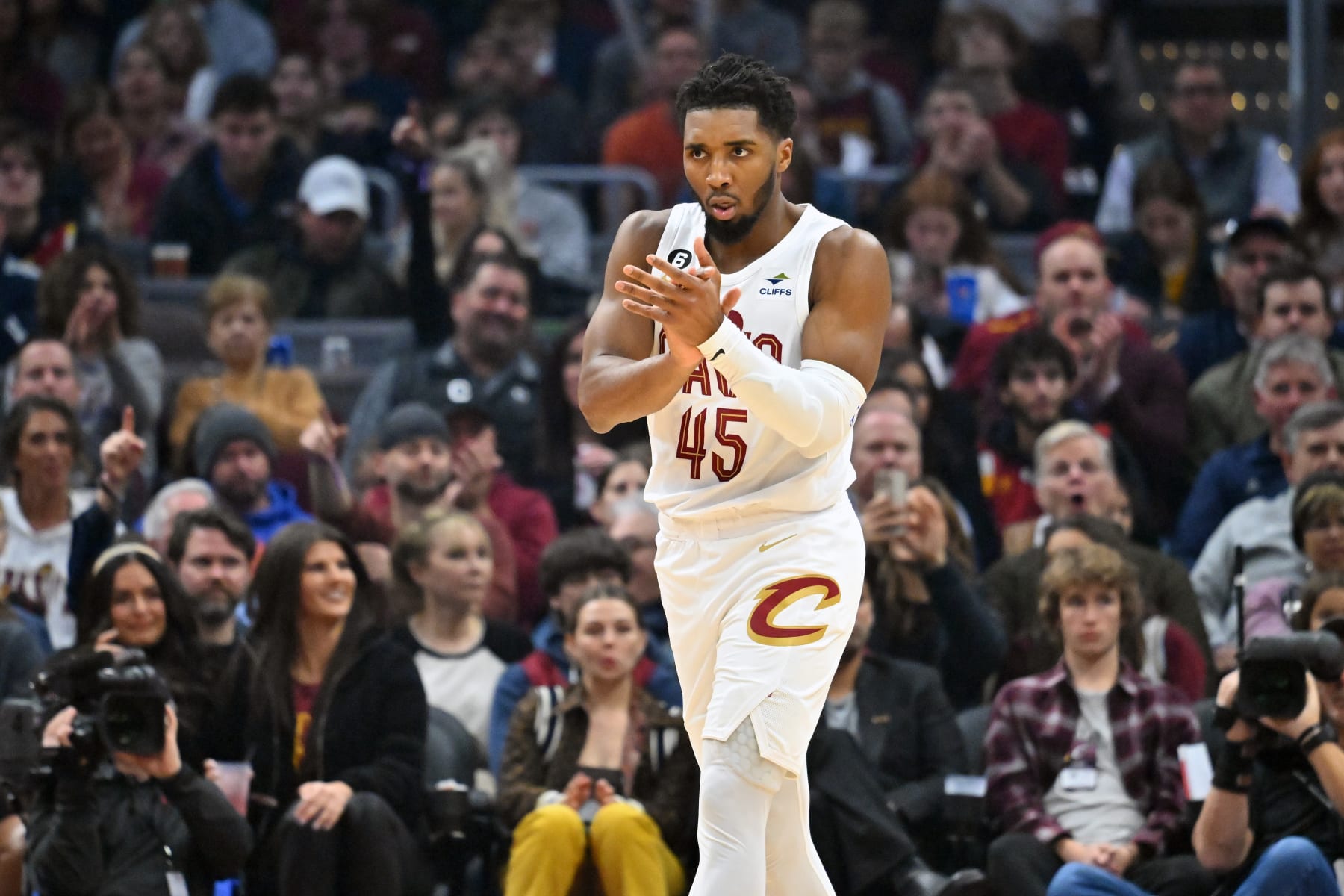 CLEVELAND, OHIO - DECEMBER 21: Donovan Mitchell #45 of the Cleveland Cavaliers celebrates during the first quarter against the Milwaukee Bucks at Rocket Mortgage Fieldhouse on December 21, 2022 in Cleveland, Ohio. NOTE TO USER: User expressly acknowledges and agrees that, by downloading and or using this photograph, User is consenting to the terms and conditions of the Getty Images License Agreement. (Photo by Jason Miller/Getty Images)