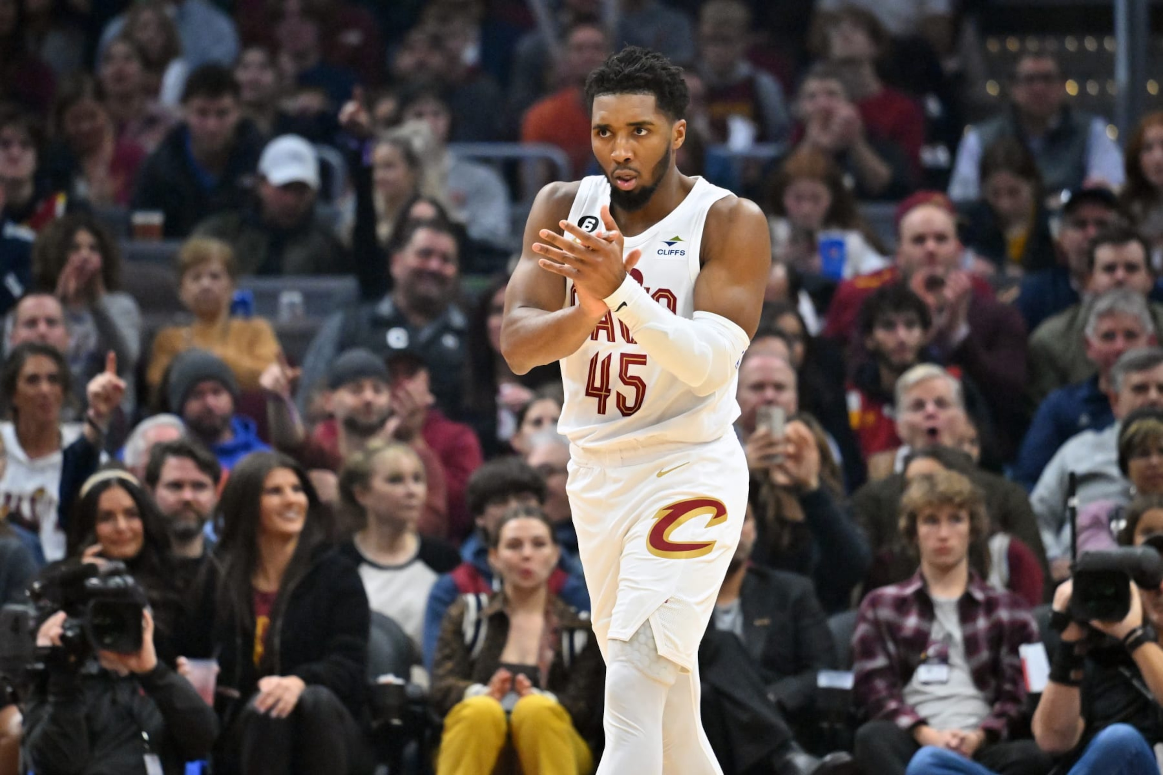 CLEVELAND, OHIO - DECEMBER 21: Donovan Mitchell #45 of the Cleveland Cavaliers celebrates during the first quarter against the Milwaukee Bucks at Rocket Mortgage Fieldhouse on December 21, 2022 in Cleveland, Ohio. NOTE TO USER: User expressly acknowledges and agrees that, by downloading and or using this photograph, User is consenting to the terms and conditions of the Getty Images License Agreement. (Photo by Jason Miller/Getty Images) CLEVELAND, OHIO - DECEMBER 21: Donovan Mitchell #45 of the Cleveland Cavaliers celebrates during the first quarter against the Milwaukee Bucks at Rocket Mortgage Fieldhouse on December 21, 2022 in Cleveland, Ohio. NOTE TO USER: User expressly acknowledges and agrees that, by downloading and or using this photograph, User is consenting to the terms and conditions of the Getty Images License Agreement. (Photo by Jason Miller/Getty Images)