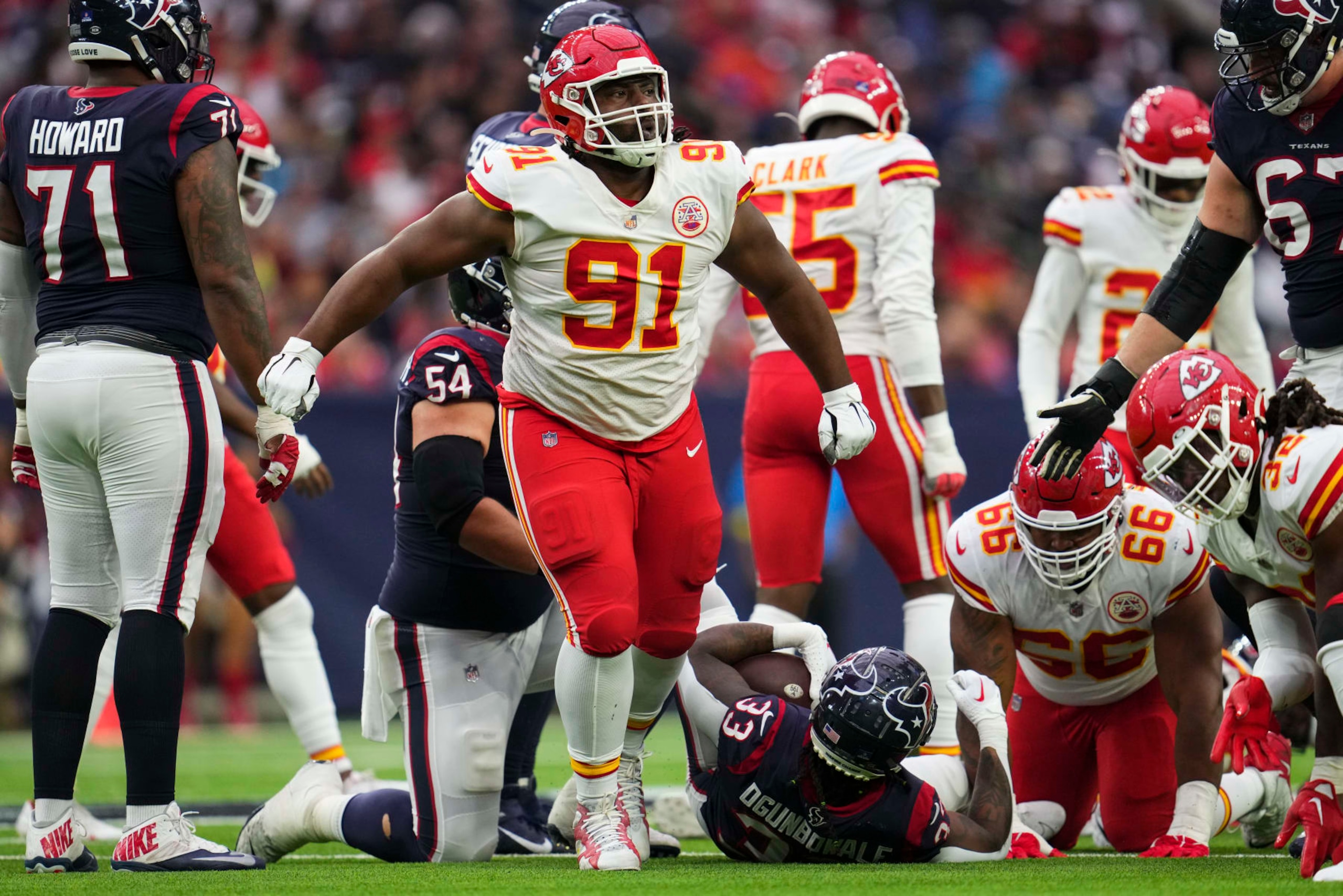 HOUSTON, TX - DECEMBER 18: Derrick Nnadi #91 of the Kansas City Chiefs celebrates against the Houston Texans at NRG Stadium on December 18, 2022 in Houston, Texas. (Photo by Cooper Neill/Getty Images)