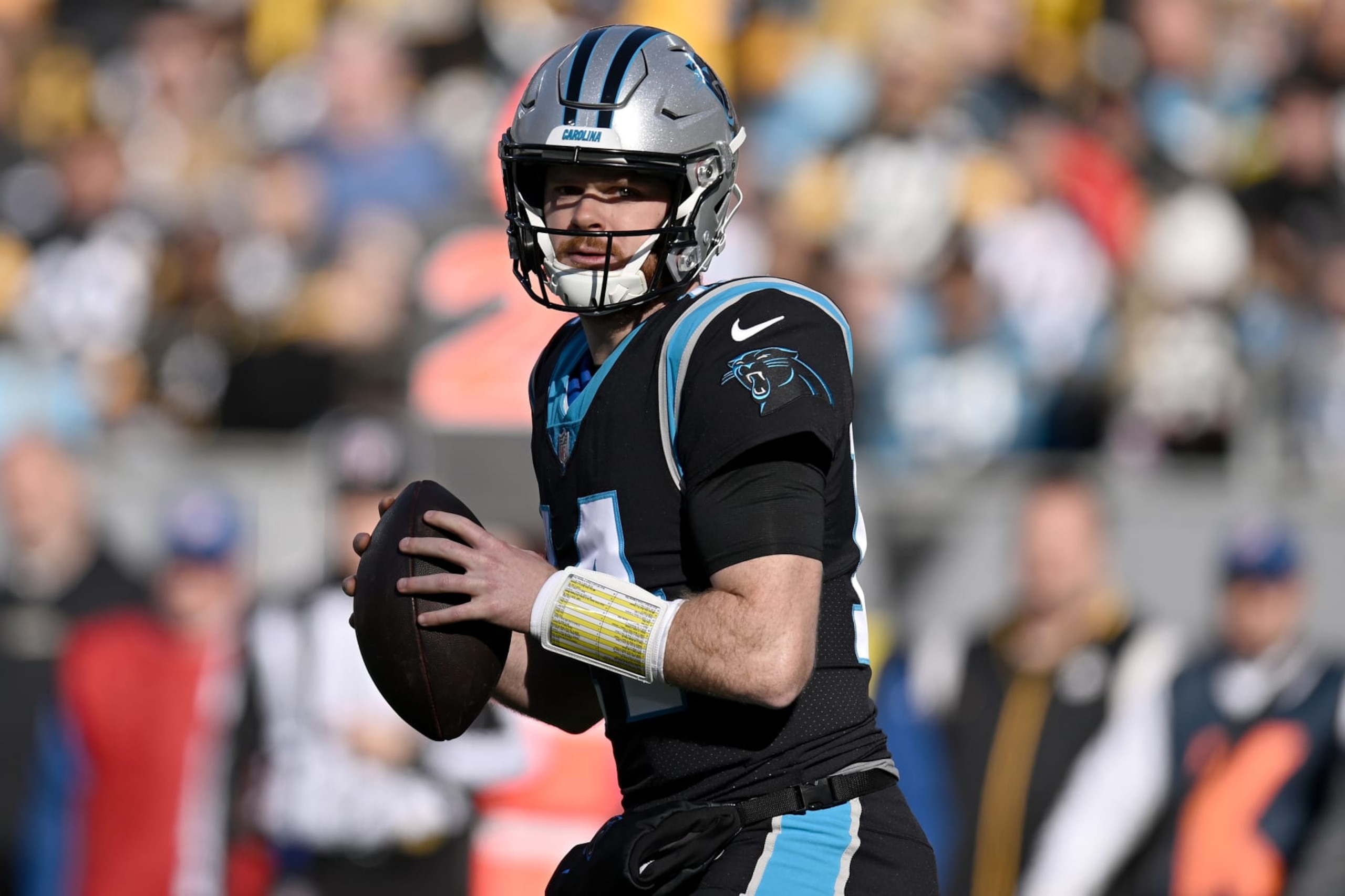 CHARLOTTE, NORTH CAROLINA - DECEMBER 18: Sam Darnold #14 of the Carolina Panthers looks to pass during the second quarter of the game against the Pittsburgh Steelers at Bank of America Stadium on December 18, 2022 in Charlotte, North Carolina. (Photo by Eakin Howard/Getty Images)