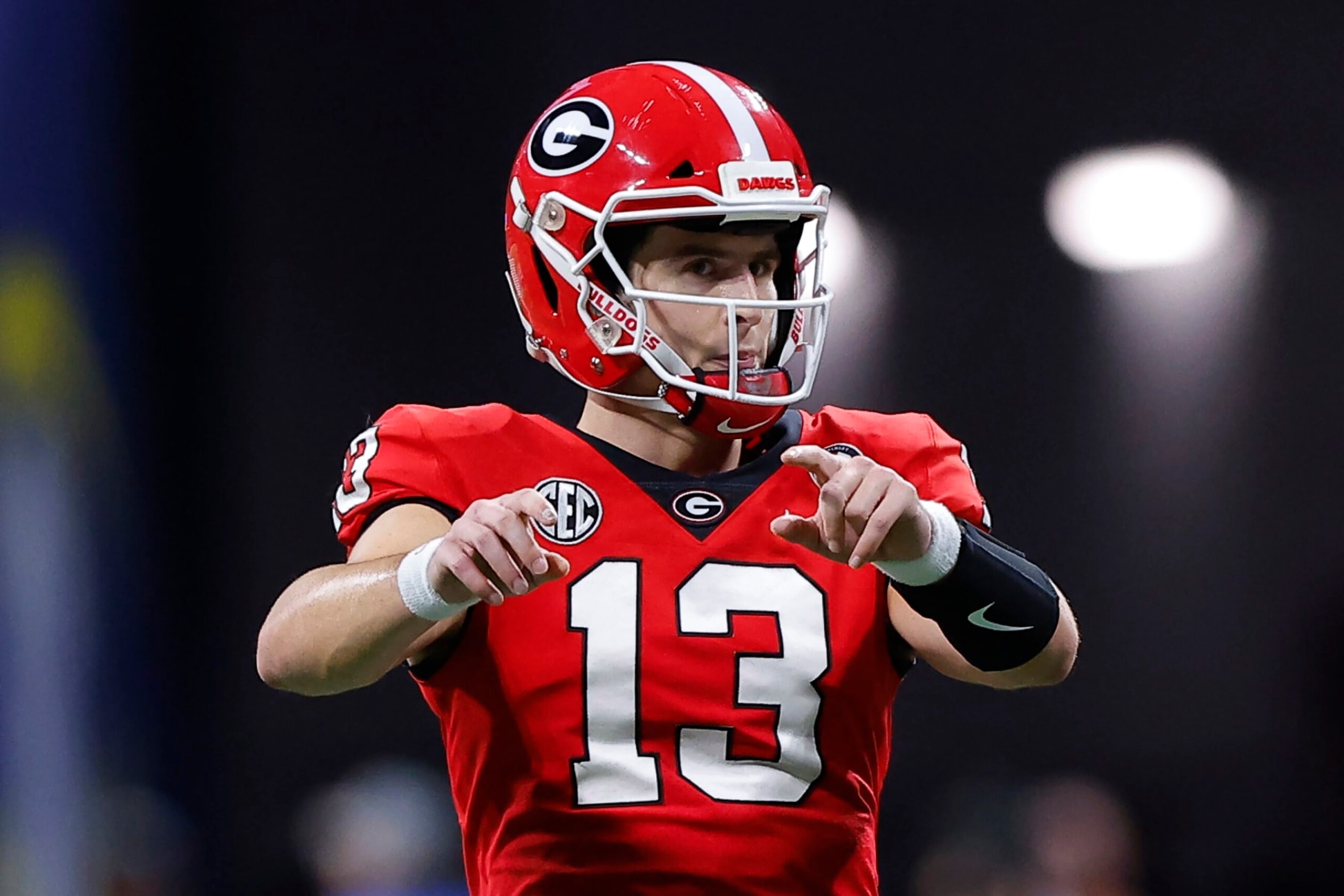 ATLANTA, GA - DECEMBER 03: Stetson Bennett #13 of the Georgia Bulldogs calls out against the LSU Tigers during the first half of the SEC Championship game at Mercedes-Benz Stadium on December 3, 2022 in Atlanta, Georgia. (Photo by Todd Kirkland/Getty Images)