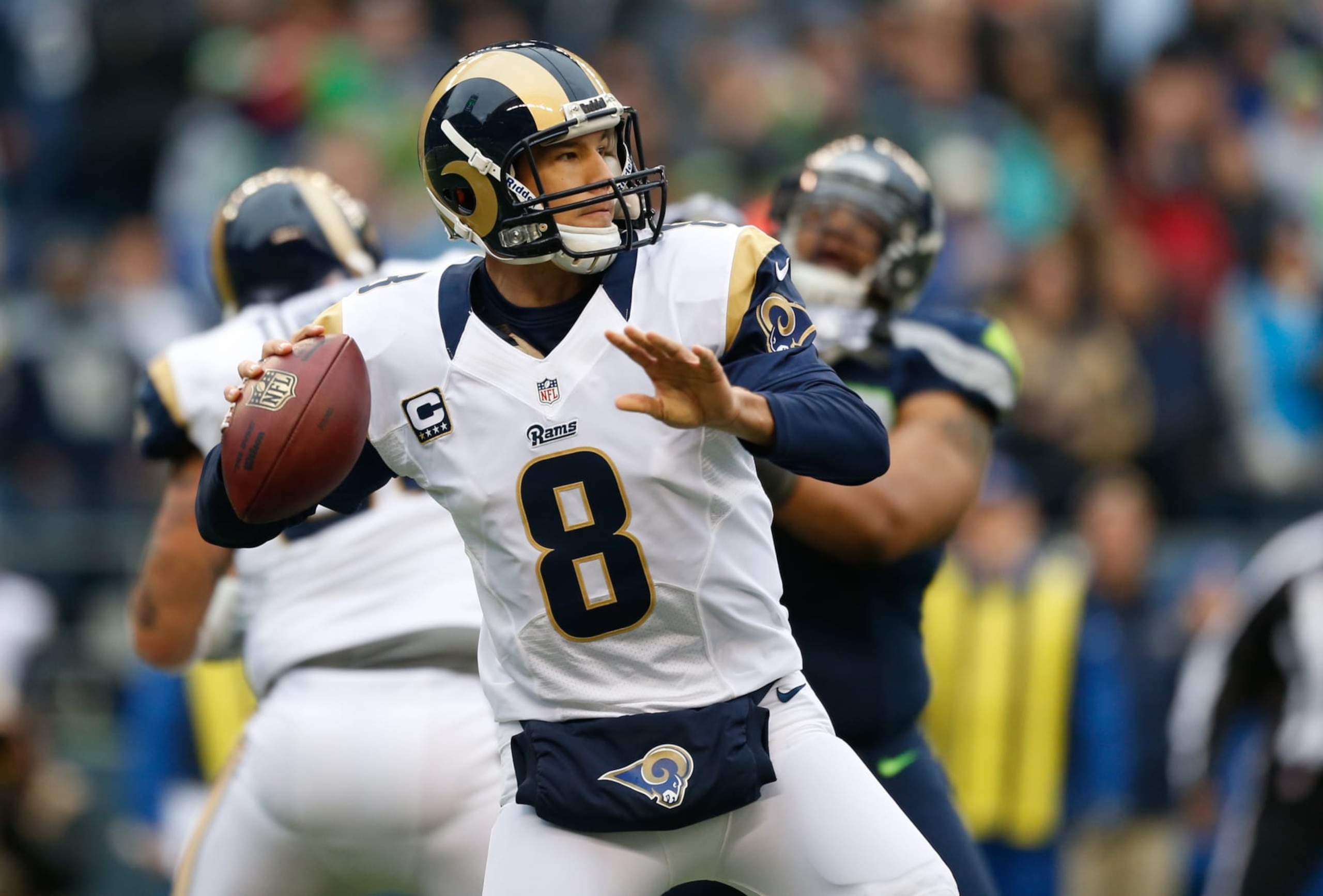 SEATTLE, WA - DECEMBER 30: Quarterback Sam Bradford #8 of the St. Louis Rams passes against the Seattle Seahawks at CenturyLink Field on December 30, 2012 in Seattle, Washington. (Photo by Otto Greule Jr/Getty Images) SEATTLE, WA - DECEMBER 30: Quarterback Sam Bradford #8 of the St. Louis Rams passes against the Seattle Seahawks at CenturyLink Field on December 30, 2012 in Seattle, Washington. (Photo by Otto Greule Jr/Getty Images)