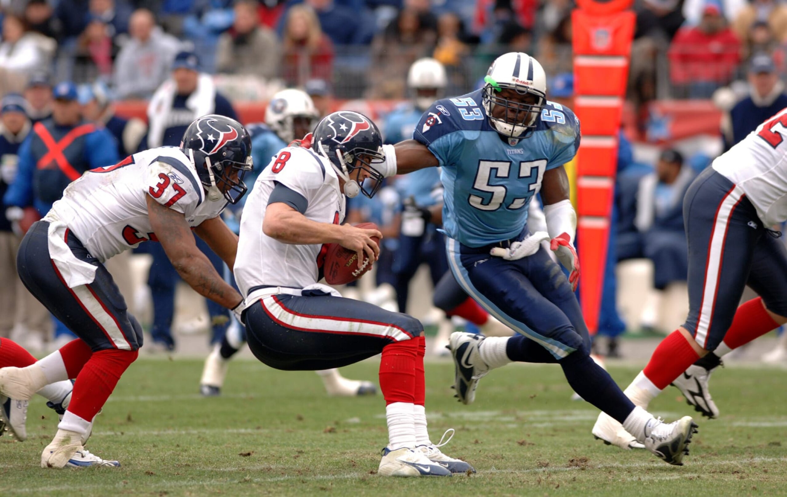 Titans Keith Bulluck #53 sacks Texans David Carr #8. The Tennessee Titans beat the Houston Texans 13-10 at The Coliseum in Nashville, TN on December 11, 2005. (Photo by Joe Murphy/NFLPhotoLibrary) Titans Keith Bulluck #53 sacks Texans David Carr #8. The Tennessee Titans beat the Houston Texans 13-10 at The Coliseum in Nashville, TN on December 11, 2005. (Photo by Joe Murphy/NFLPhotoLibrary)