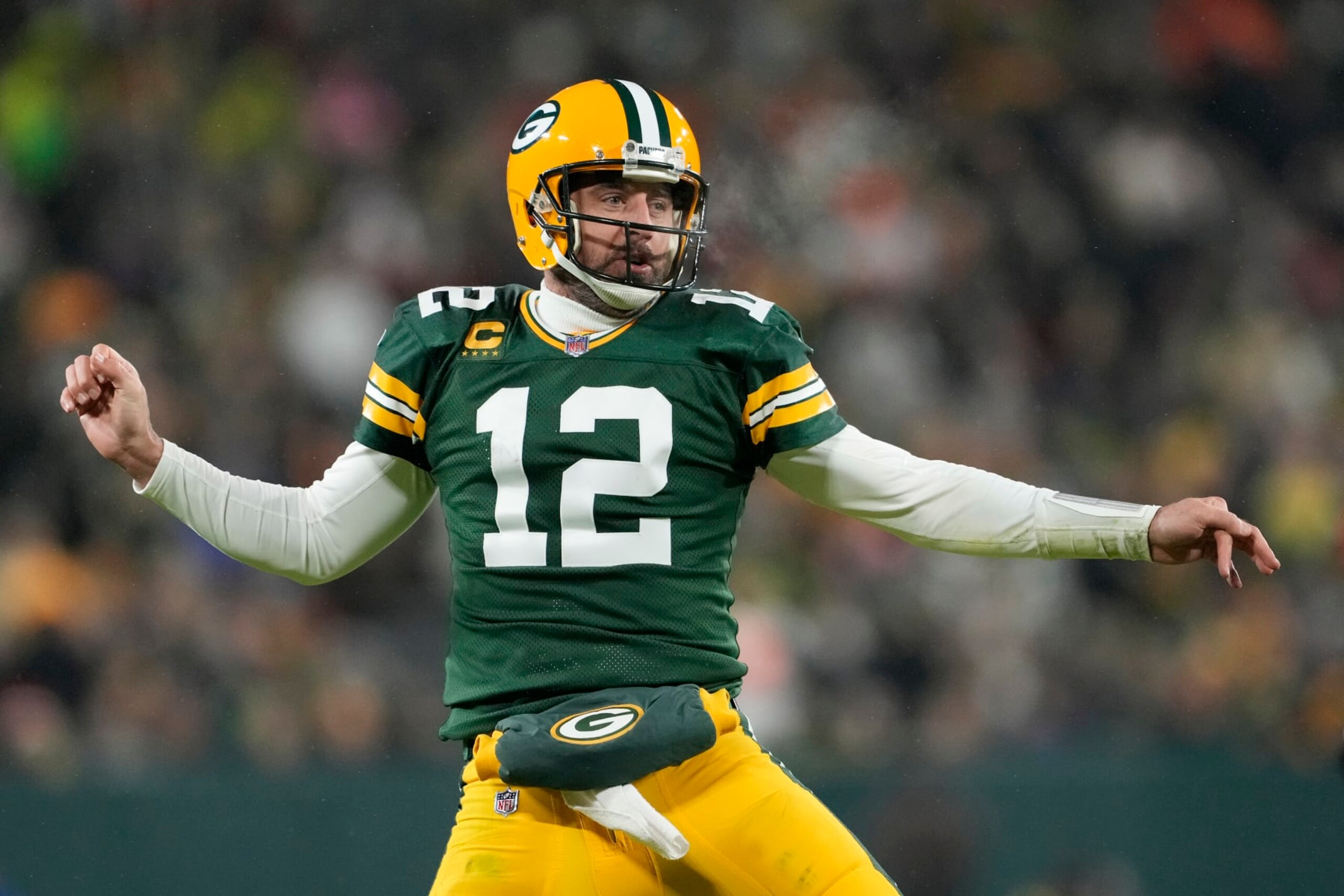GREEN BAY, WISCONSIN - DECEMBER 19: Aaron Rodgers #12 of the Green Bay Packers reacts after a play against the Los Angeles Rams in the second half at Lambeau Field on December 19, 2022 in Green Bay, Wisconsin. (Photo by Patrick McDermott/Getty Images) GREEN BAY, WISCONSIN - DECEMBER 19: Aaron Rodgers #12 of the Green Bay Packers reacts after a play against the Los Angeles Rams in the second half at Lambeau Field on December 19, 2022 in Green Bay, Wisconsin. (Photo by Patrick McDermott/Getty Images)
