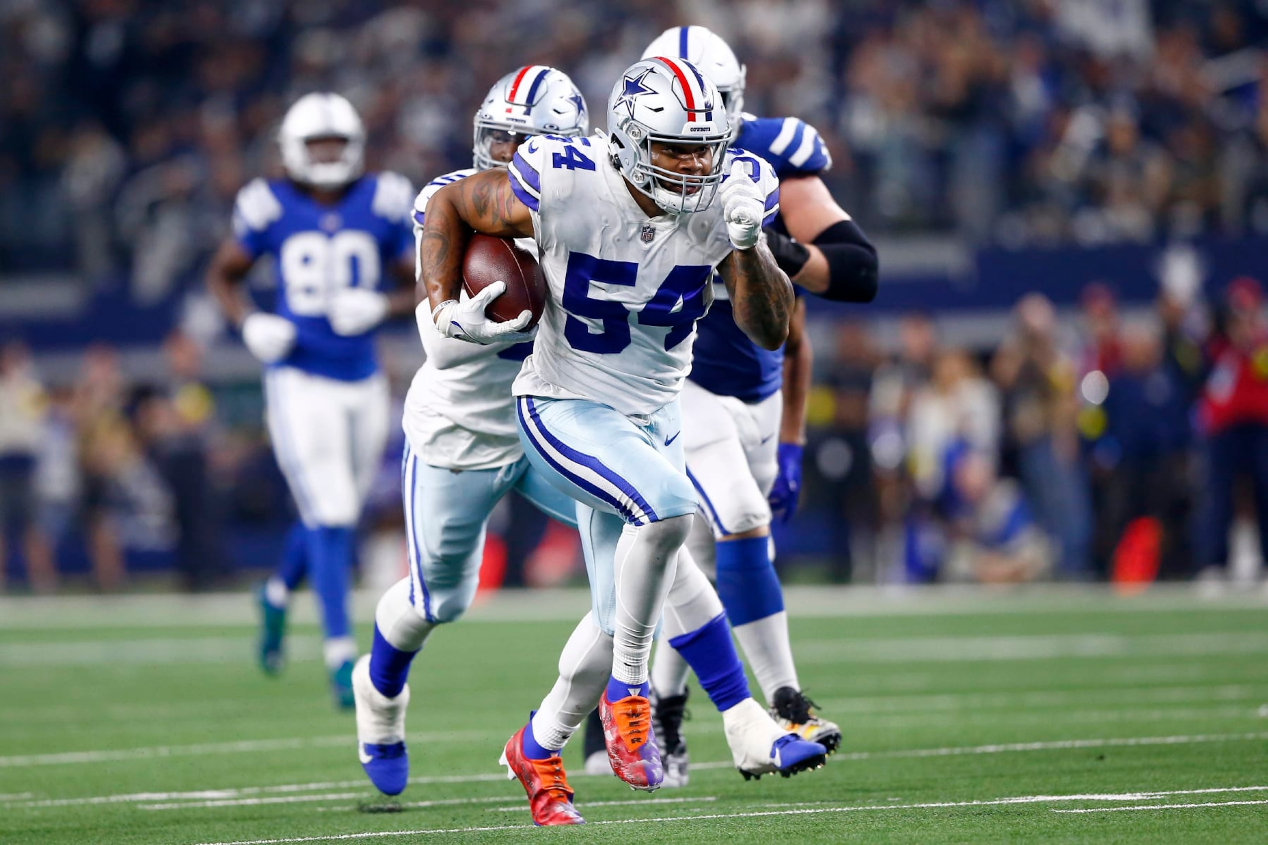 ARLINGTON, TX - DECEMBER 04: Dallas Cowboys defensive end Sam Williams (54) runs his fumble recovery in for a touchdown during and NFL game between the Indianapolis Colts and the Dallas Cowboys on December 04, 2022 at AT&T Stadium in Arlington TX.  (Photo by Jeffrey Brown/Icon Sportswire via Getty Images)