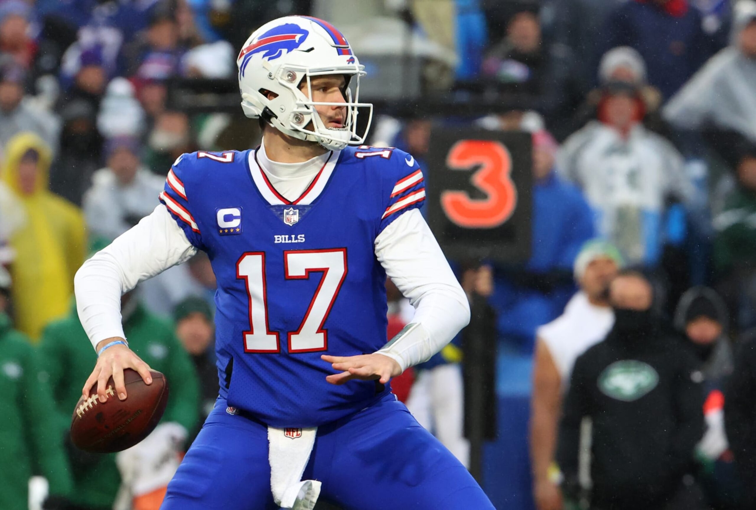 ORCHARD PARK, NY - DECEMBER 11: Josh Allen #17 of the Buffalo Bills looks to throw a pass against the New York Jets at Highmark Stadium on December 11, 2022 in Orchard Park, New York. (Photo by Timothy T Ludwig/Getty Images)