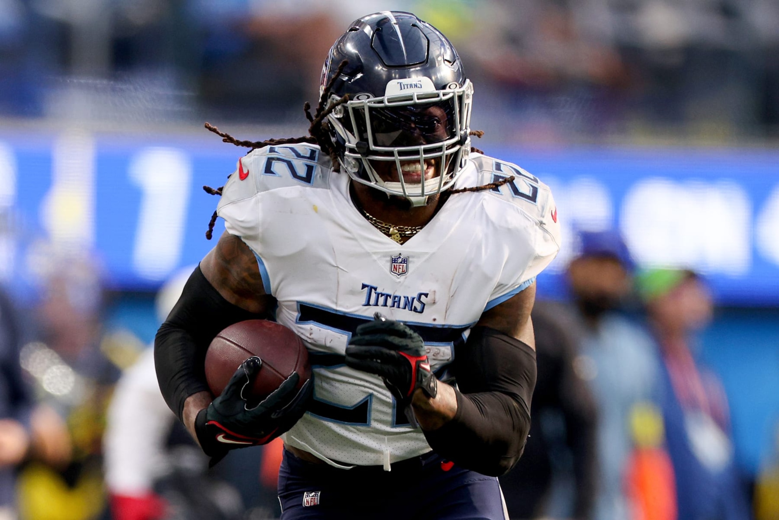 INGLEWOOD, CALIFORNIA - DECEMBER 18: Derrick Henry #22 of the Tennessee Titans runs the ball during the second quarter of the game against the Los Angeles Chargers at SoFi Stadium on December 18, 2022 in Inglewood, California. (Photo by Harry How/Getty Images) INGLEWOOD, CALIFORNIA - DECEMBER 18: Derrick Henry #22 of the Tennessee Titans runs the ball during the second quarter of the game against the Los Angeles Chargers at SoFi Stadium on December 18, 2022 in Inglewood, California. (Photo by Harry How/Getty Images)