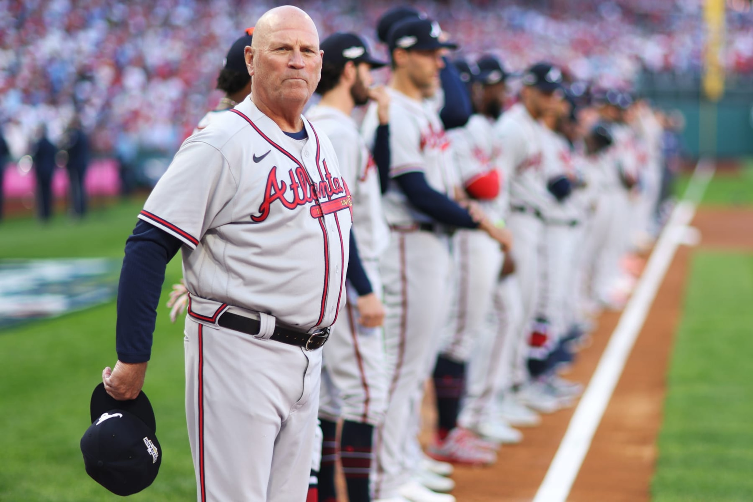 PHILADELPHIA, PA - OCTOBER 14: Manager Brian Snitker #43 lines the base paths with members of the Atlanta Braves prior to the game between the Atlanta Braves and the Philadelphia Phillies at Citizens Bank Park on Friday, October 14, 2022 in Philadelphia, Pennsylvania. (Photo by Rob Tringali/MLB Photos via Getty Images)